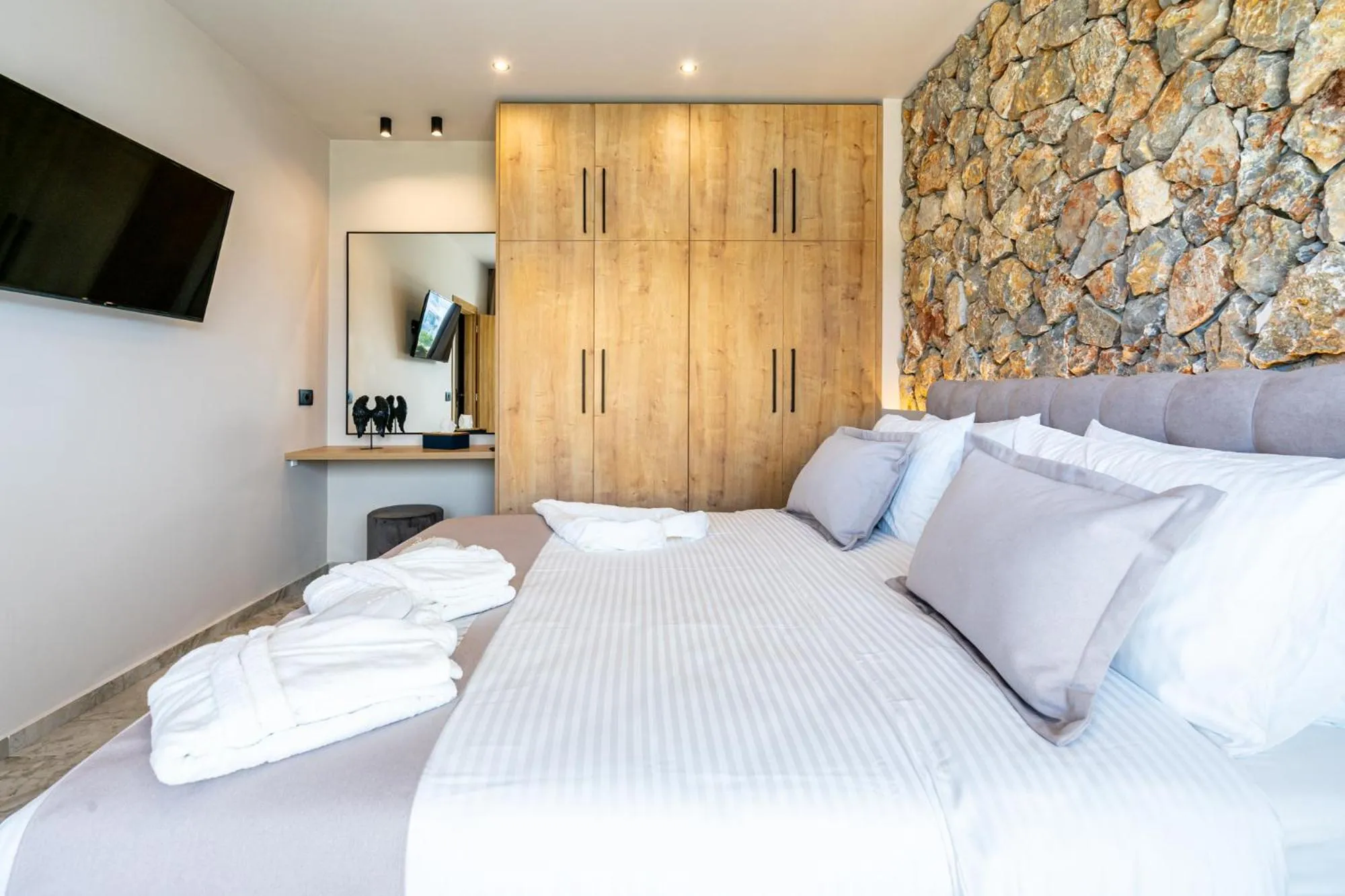 Bed in Pathos SeaSide Suites