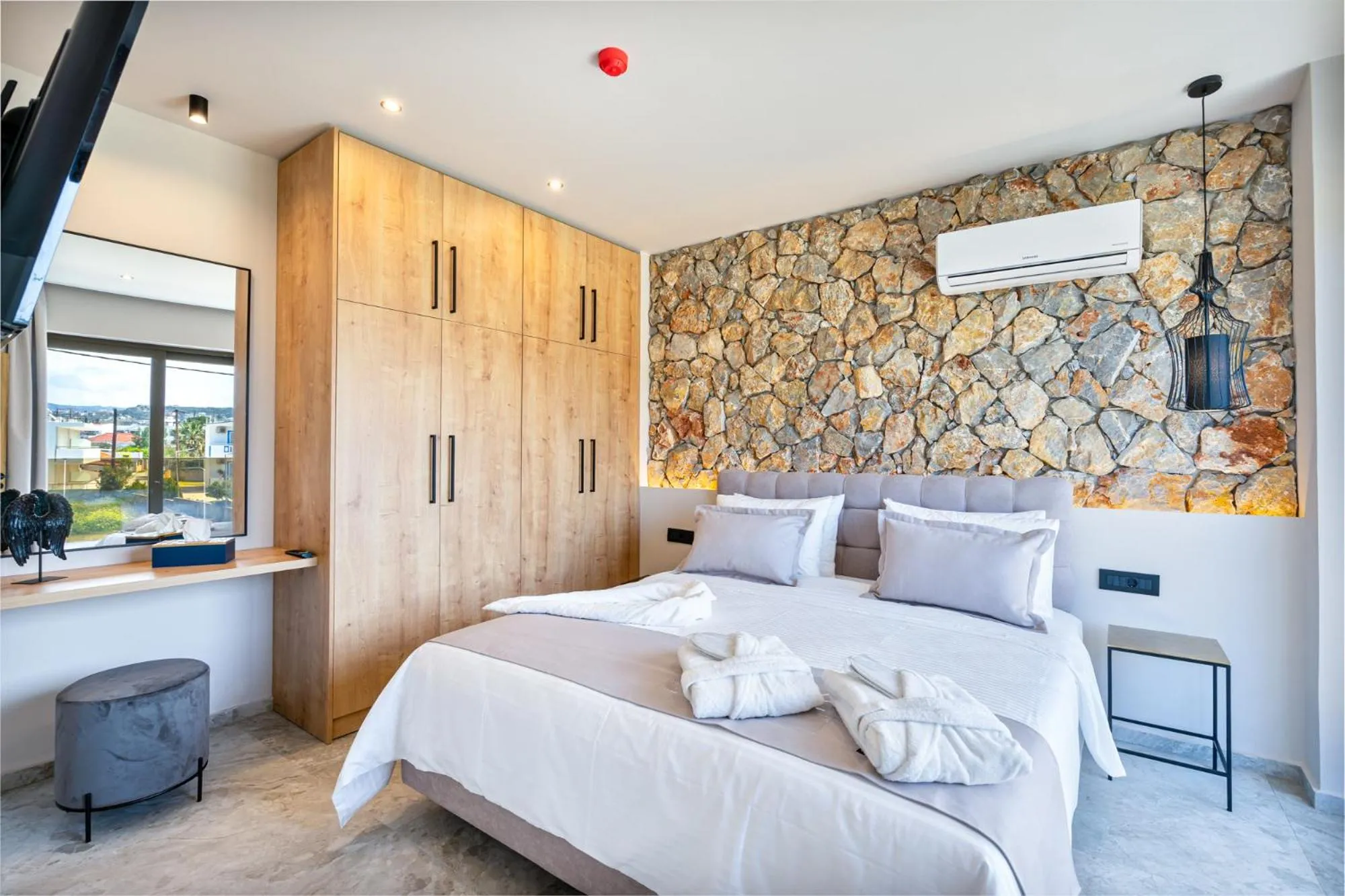 Bed in Pathos SeaSide Suites