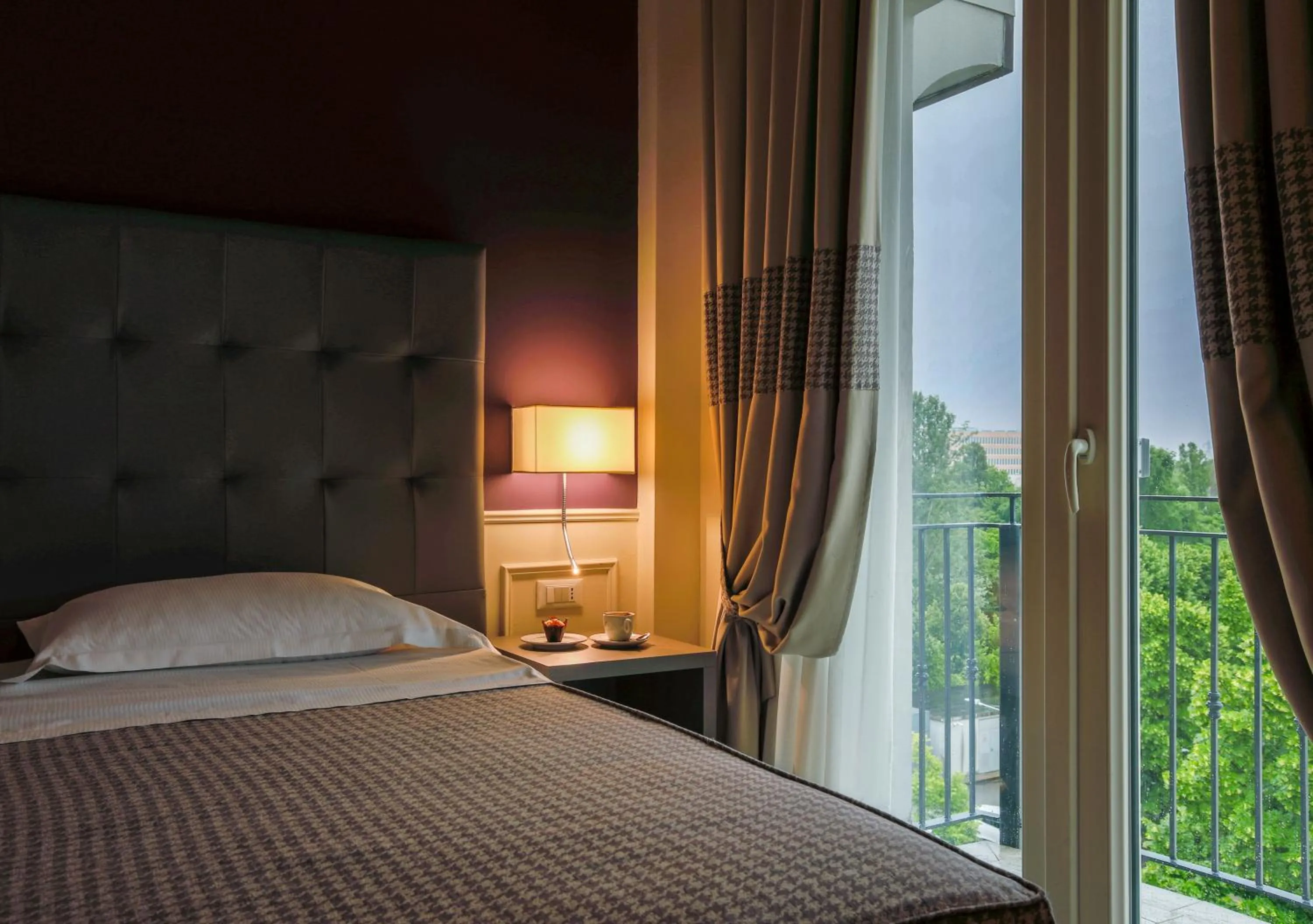 Bed in Savoia Hotel Regency