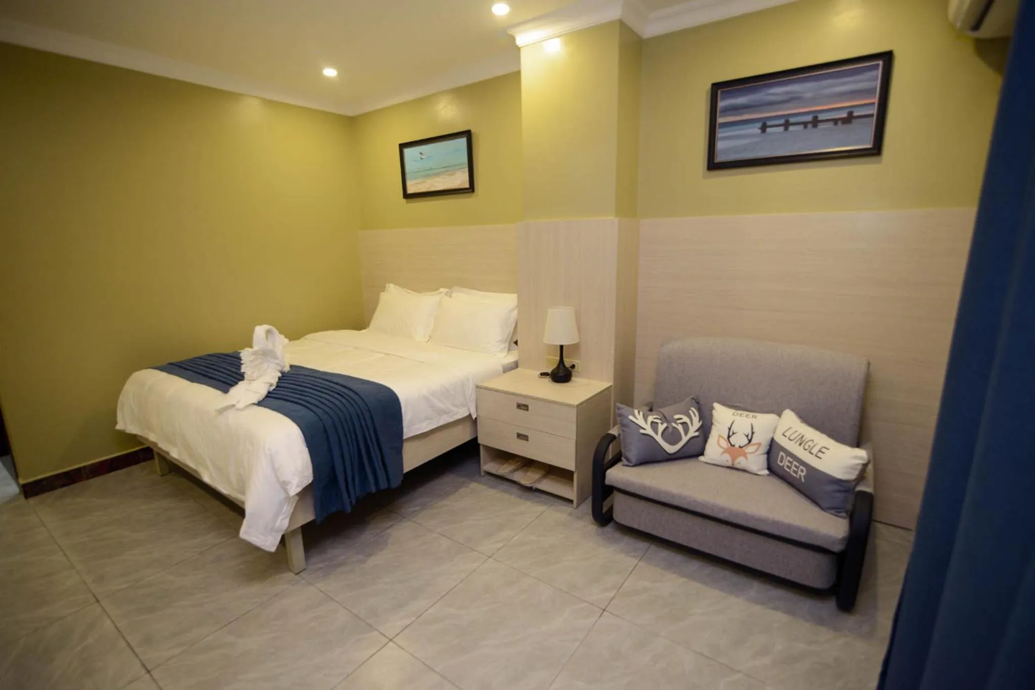 Bed in The Caye Hotel Caye Caulker