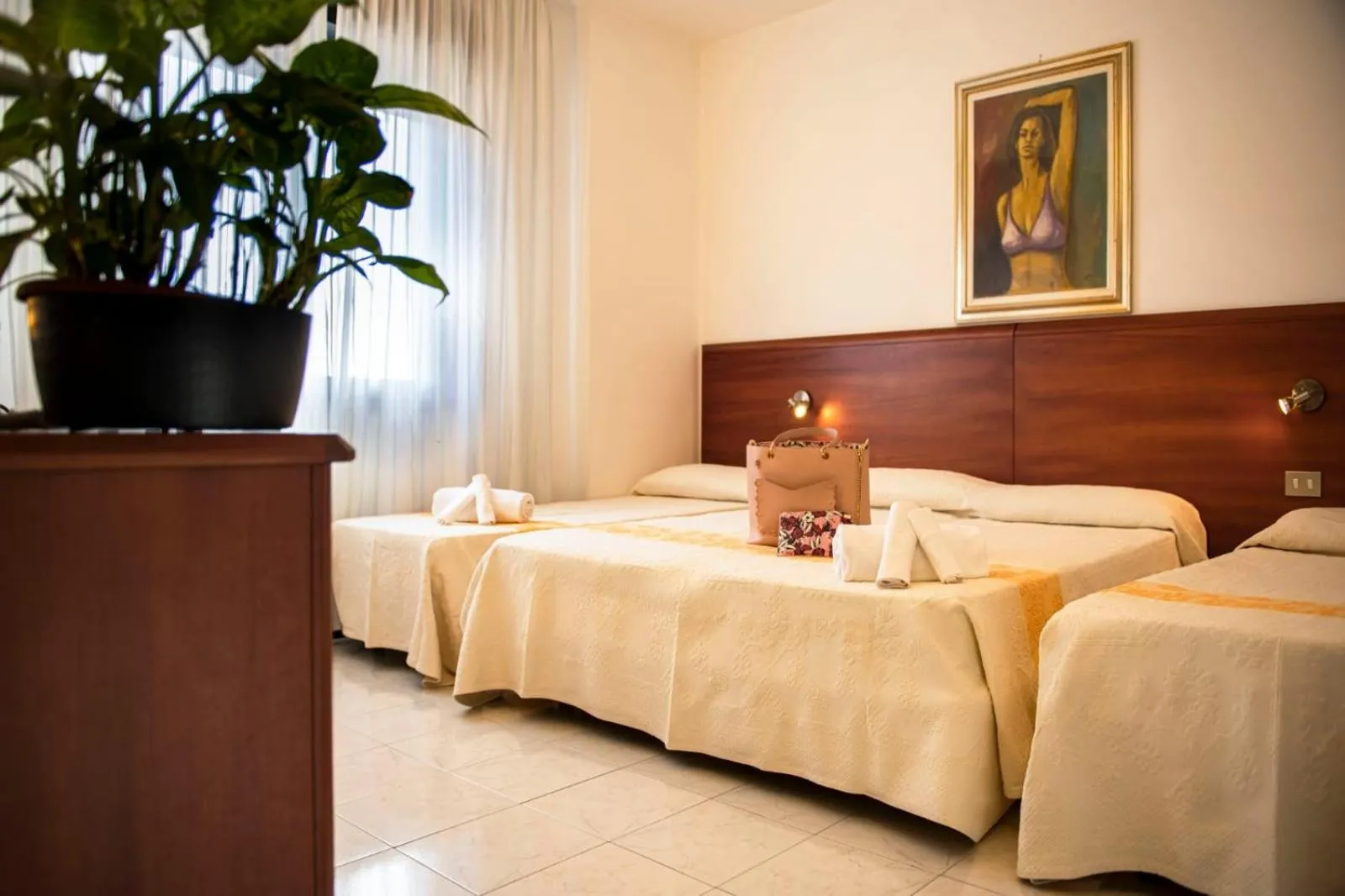 Bed in Hotel Califfo