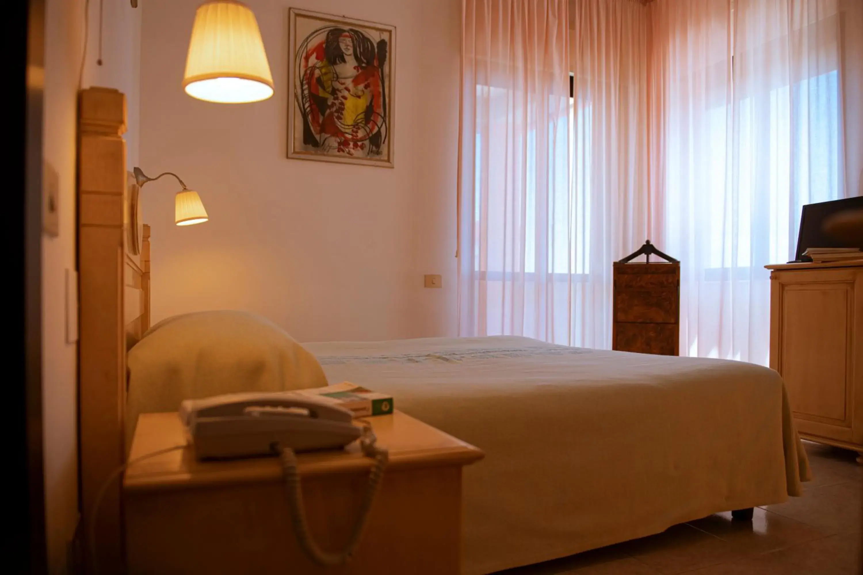 Photo of the whole room, Bed in Hotel Califfo Photo of the whole room, Bed in Hotel Califfo