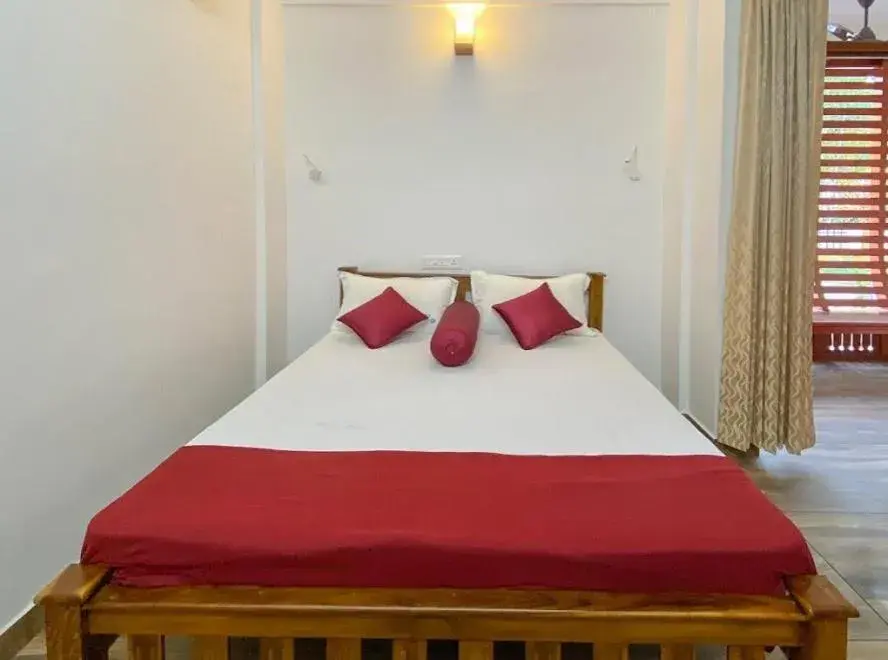 Bed in Coral Cove Beach Resort Bed in Coral Cove Beach Resort