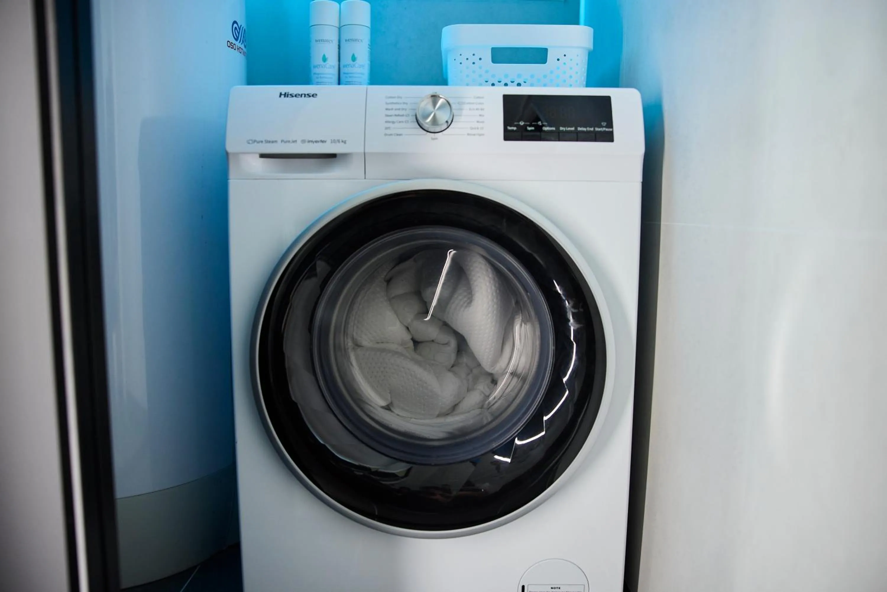 washing machine in Lofoten panorama luxury home with sauna in Reine