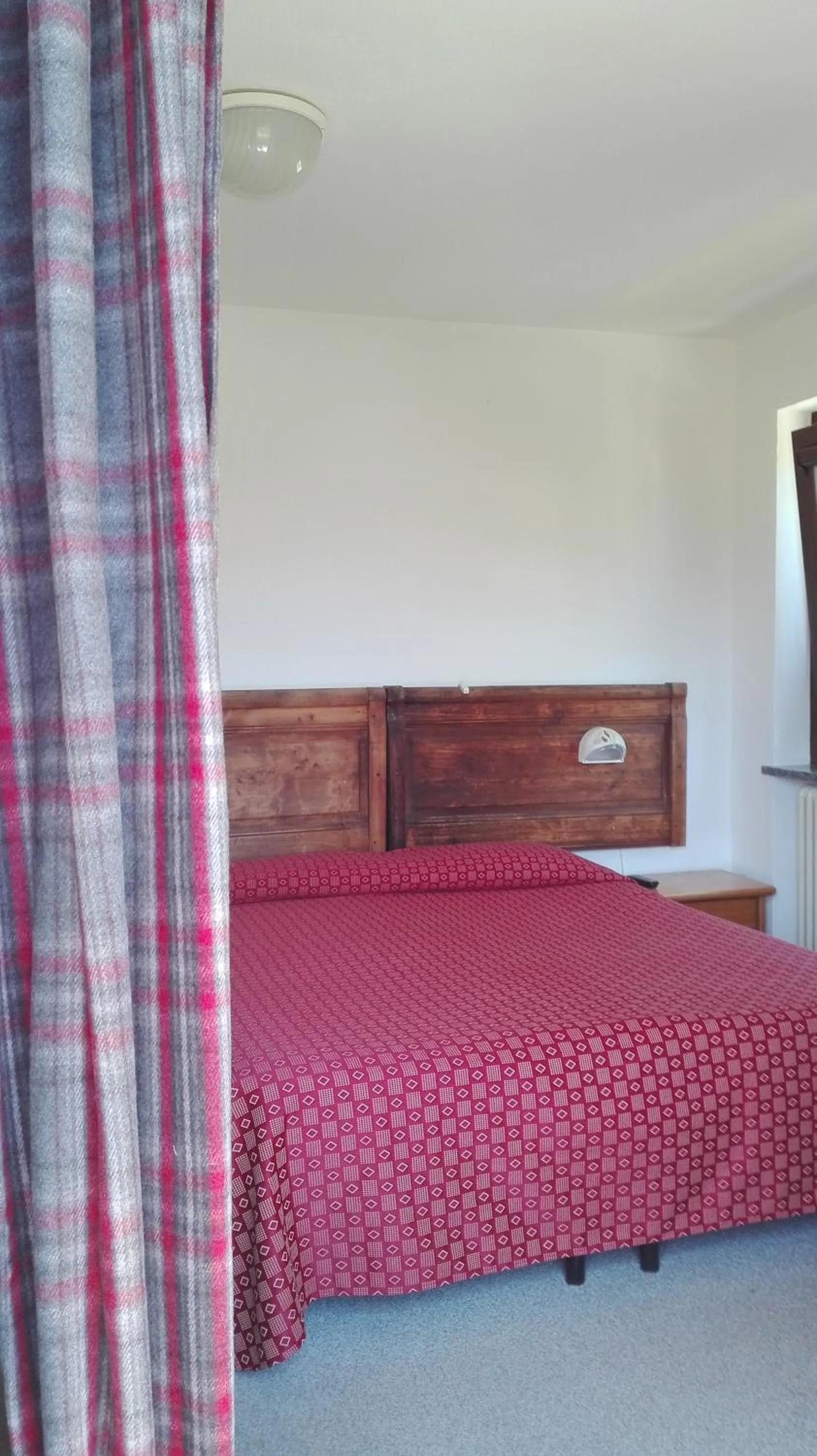 Bed in Hotel Saint Nicolas Gran Paradiso