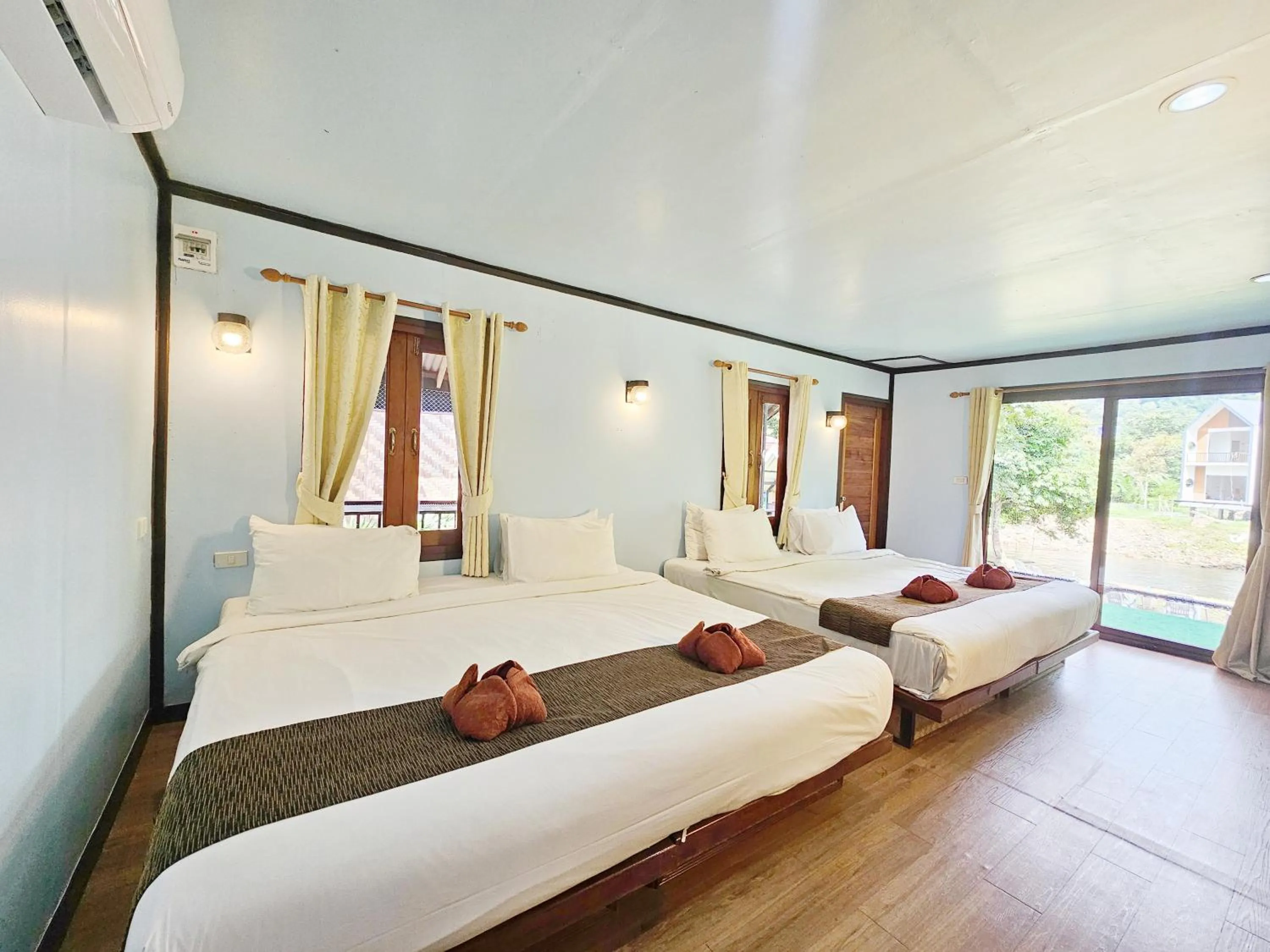 Property building, Bed in Khao Sok Cabana Resort