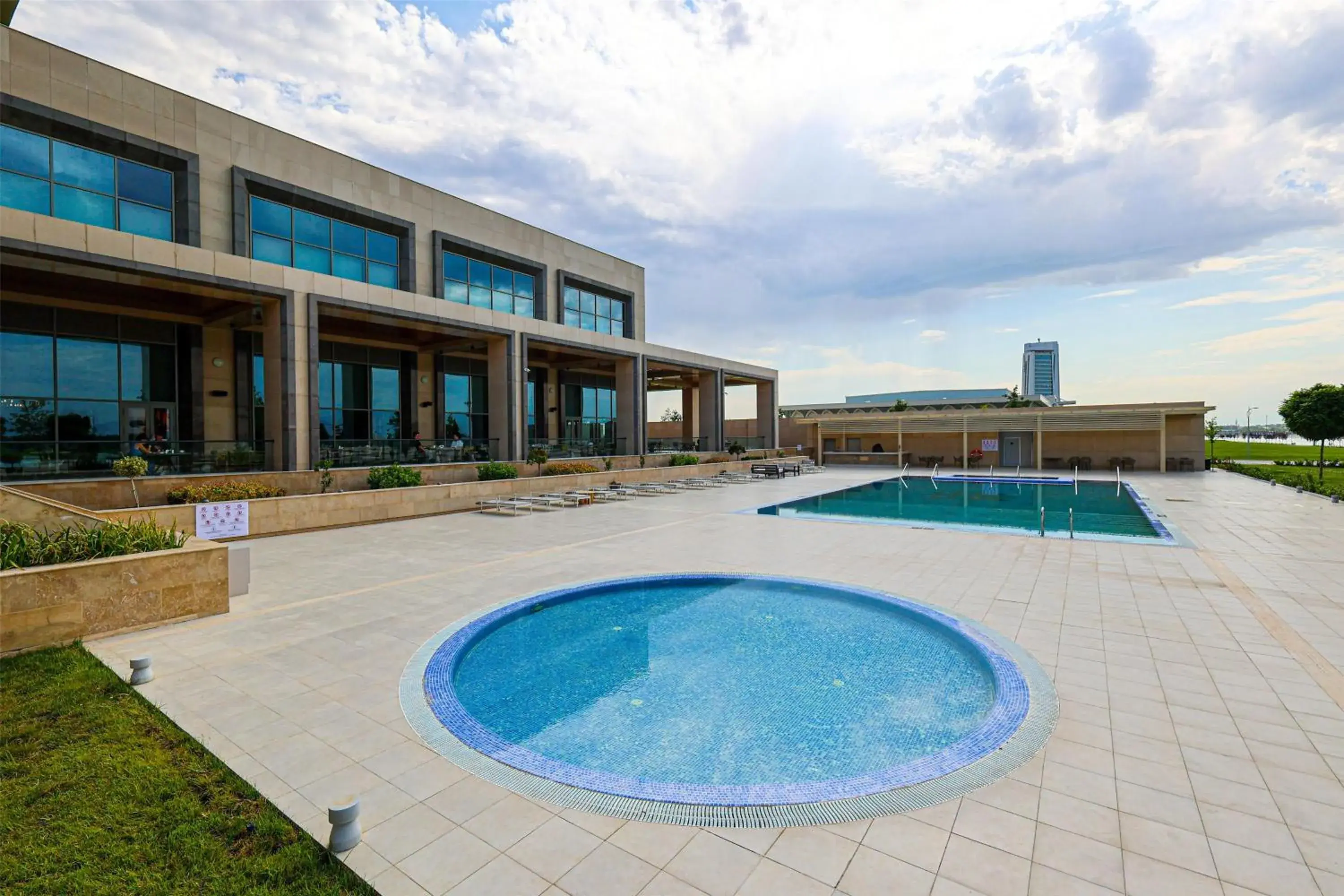 Pool view in Hilton Samarkand Regency Pool view in Hilton Samarkand Regency