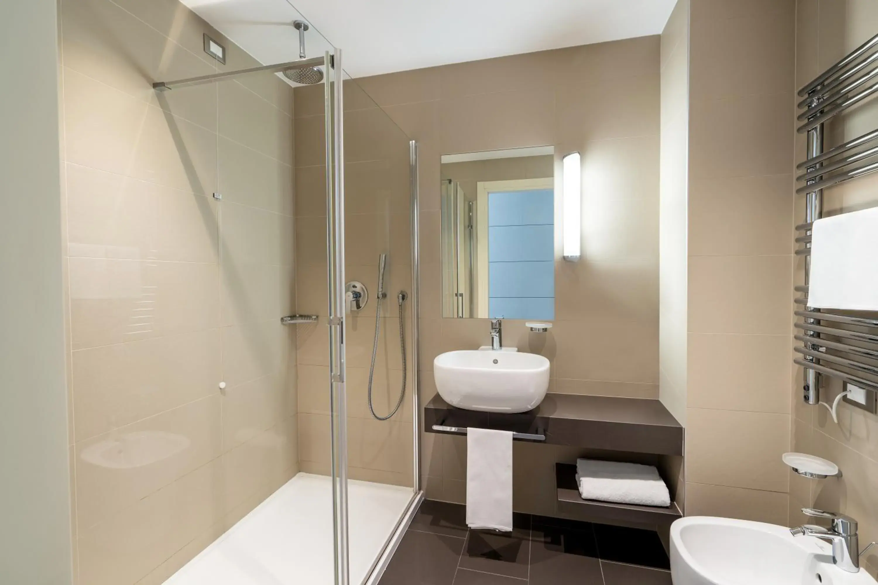 Bathroom in UNA Hotels Bologna Fiera Bathroom in UNA Hotels Bologna Fiera