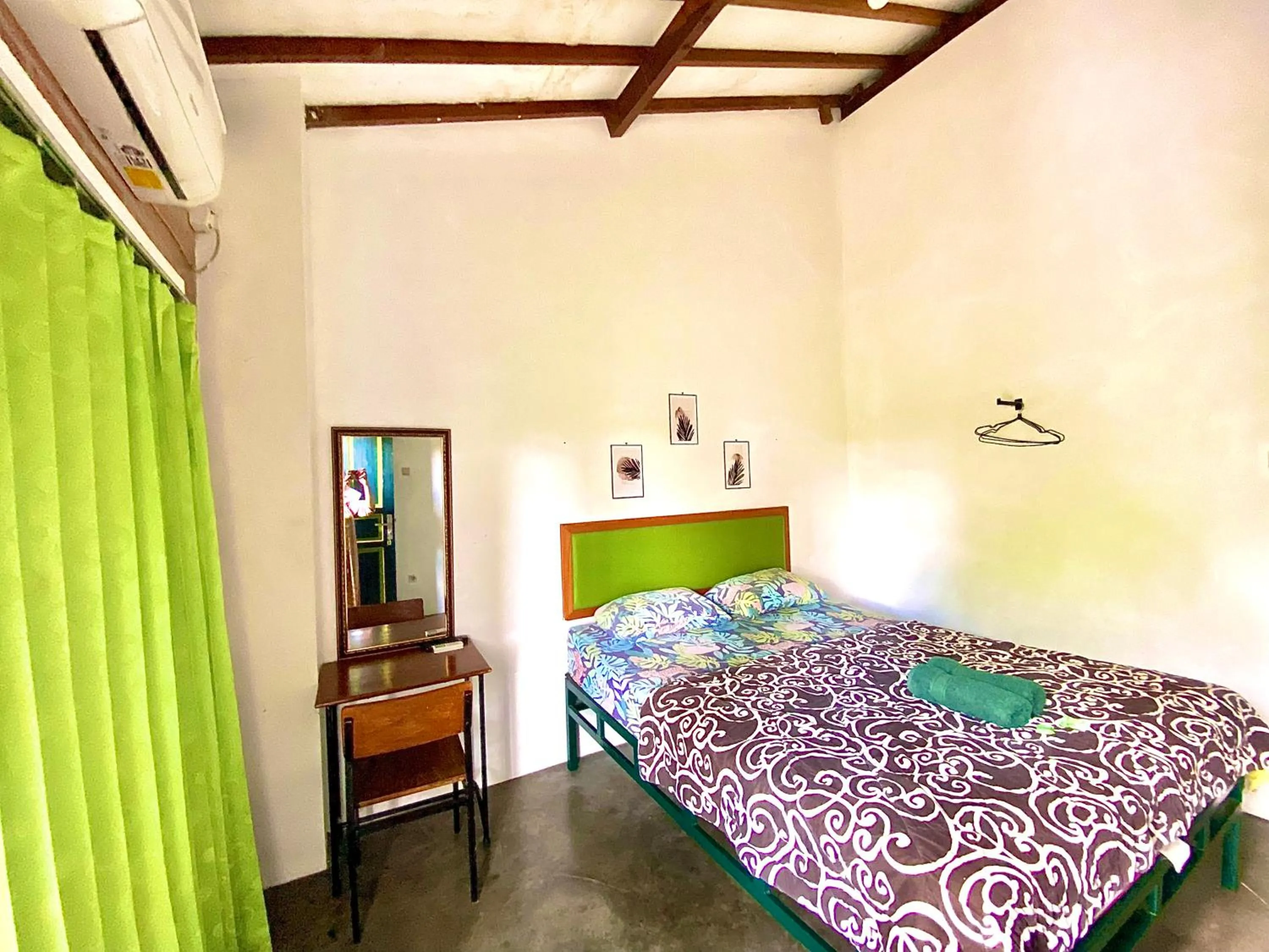 Bed in Sonosewu Guesthouse Syariah