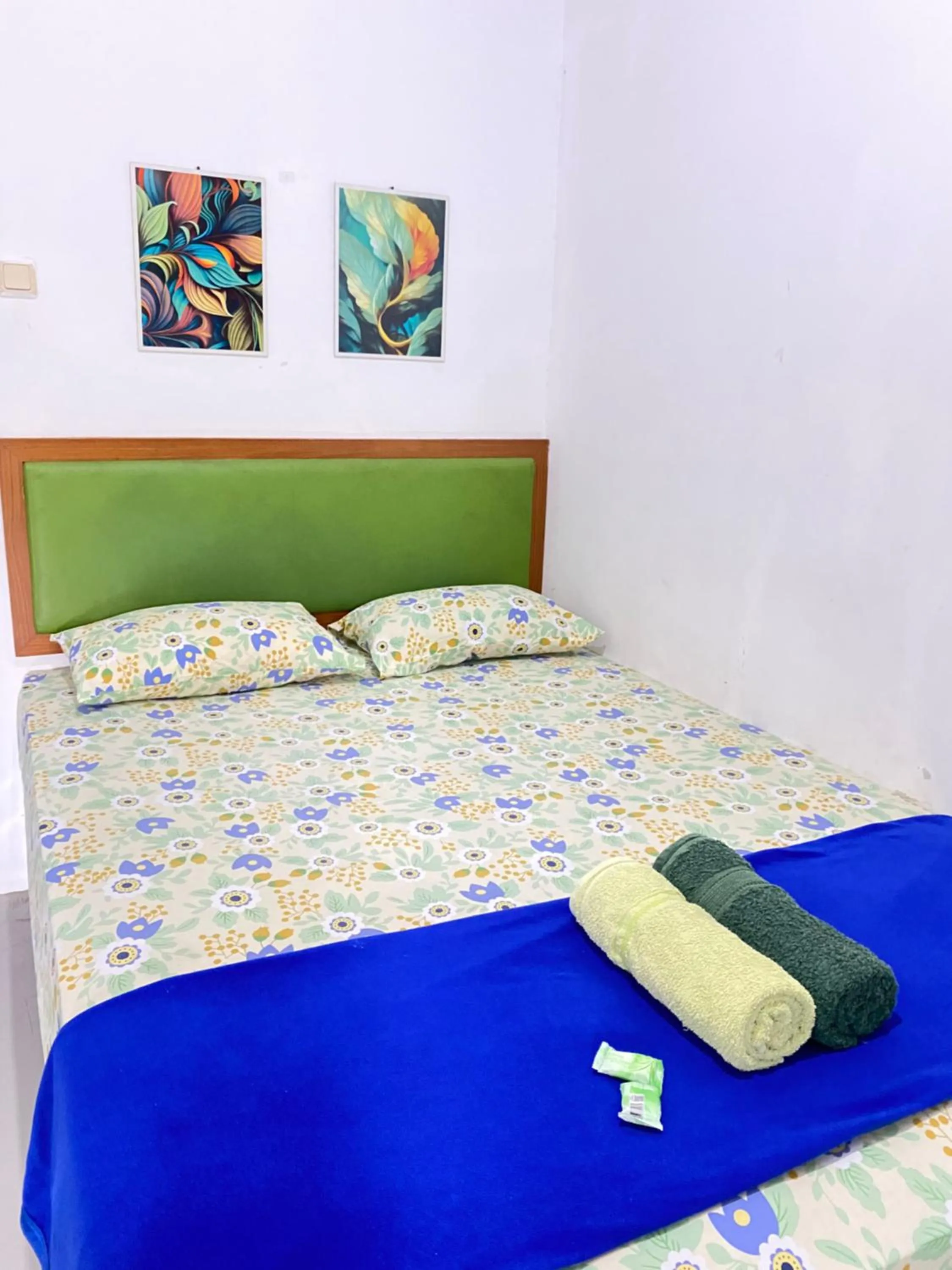 Bed in Sonosewu Guesthouse Syariah