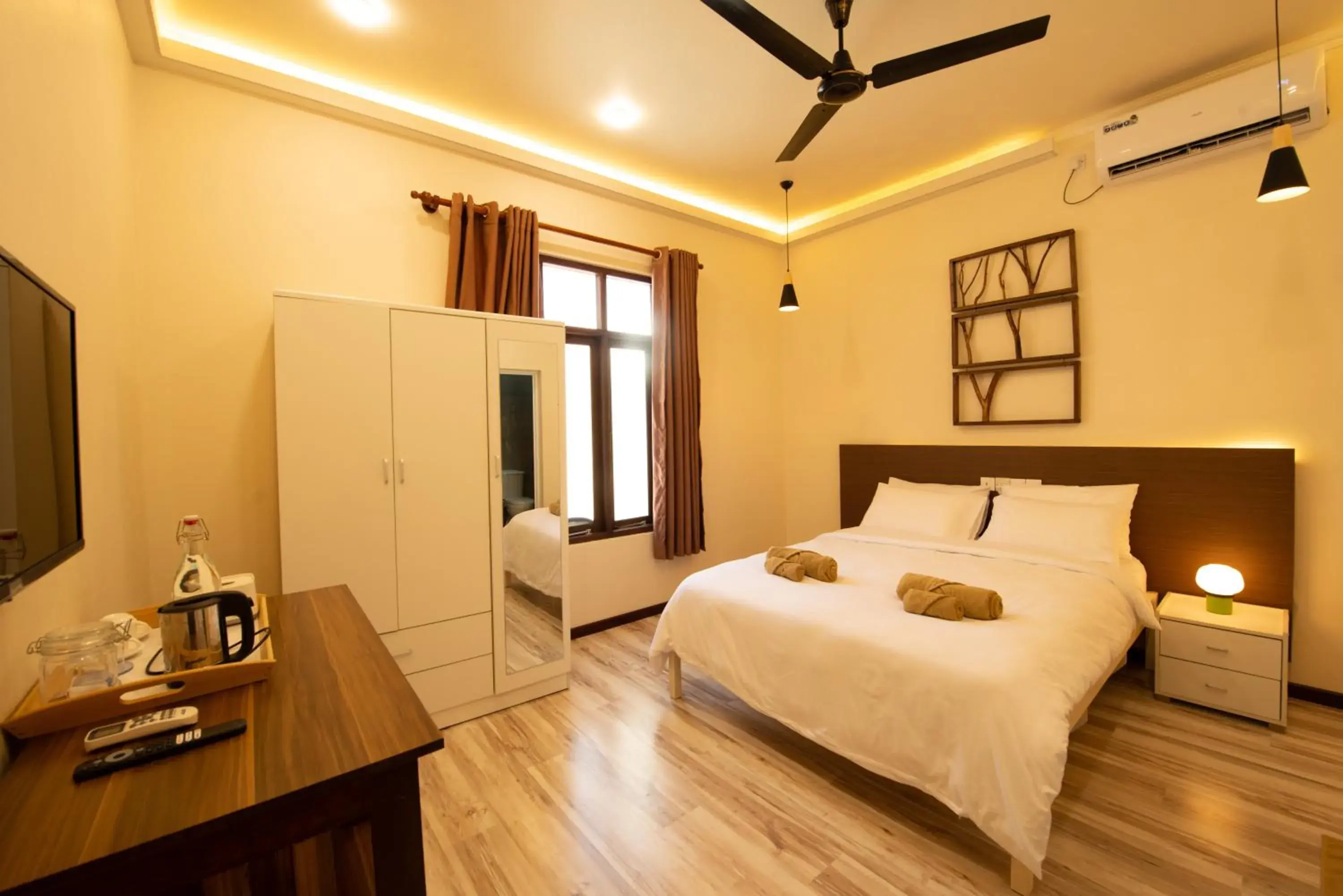 TV and multimedia, Bed in The Bilimbi Guesthouse & Inn TV and multimedia, Bed in The Bilimbi Guesthouse & Inn