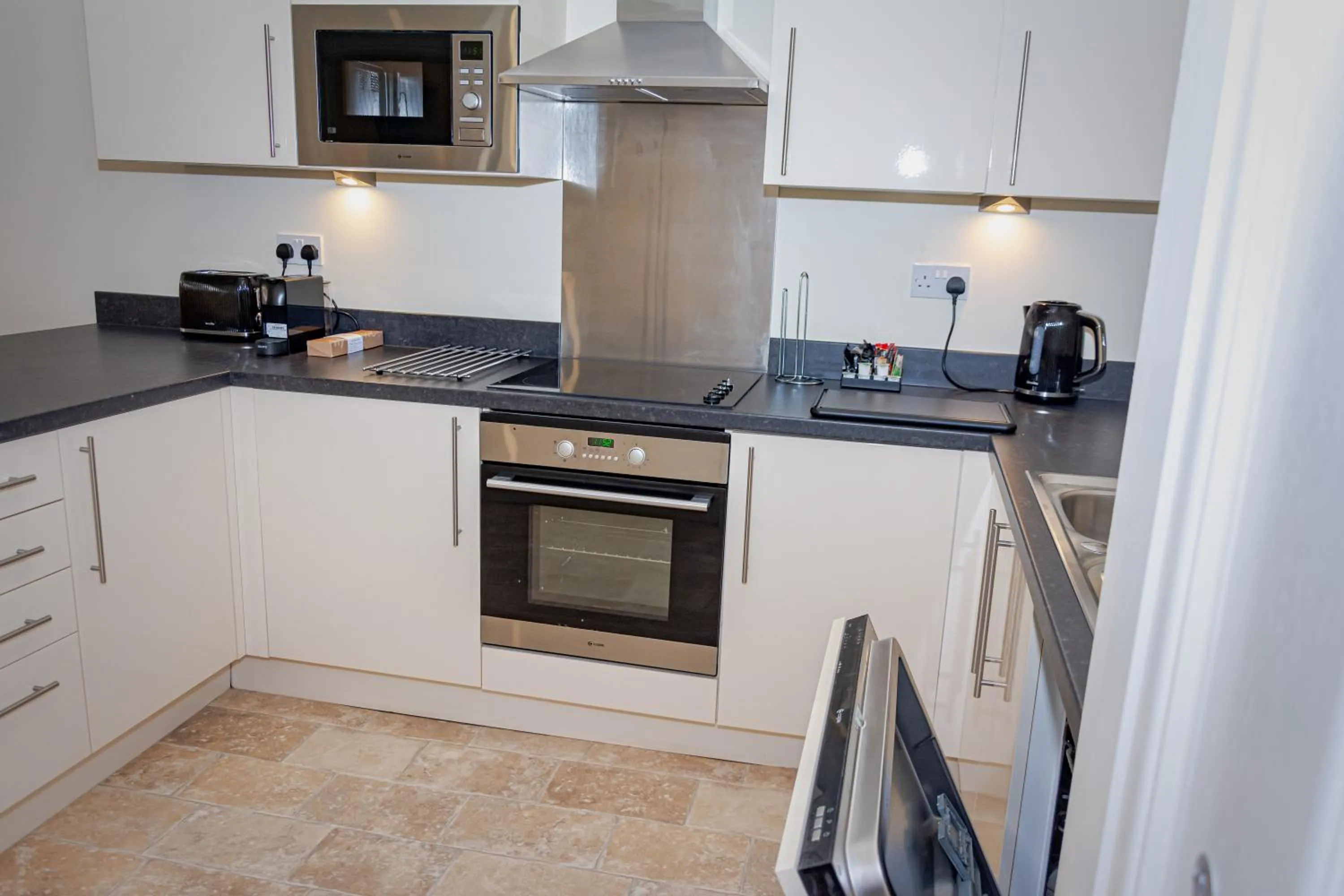 Kitchen or kitchenette in Mode Apartments Winter Gardens Blackpool