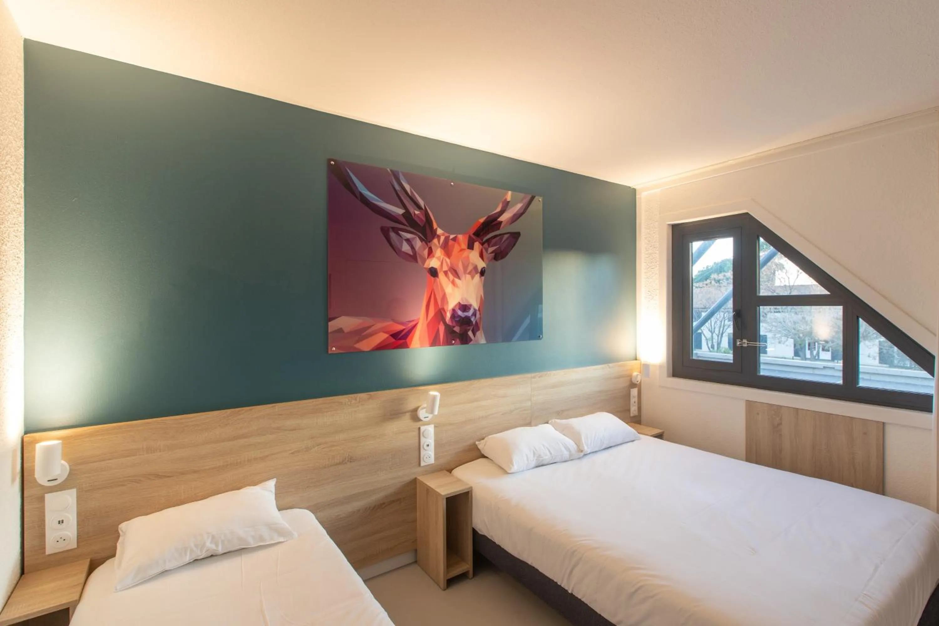 Decorative detail, Bed in Kyriad ECO - Narbonne Sud