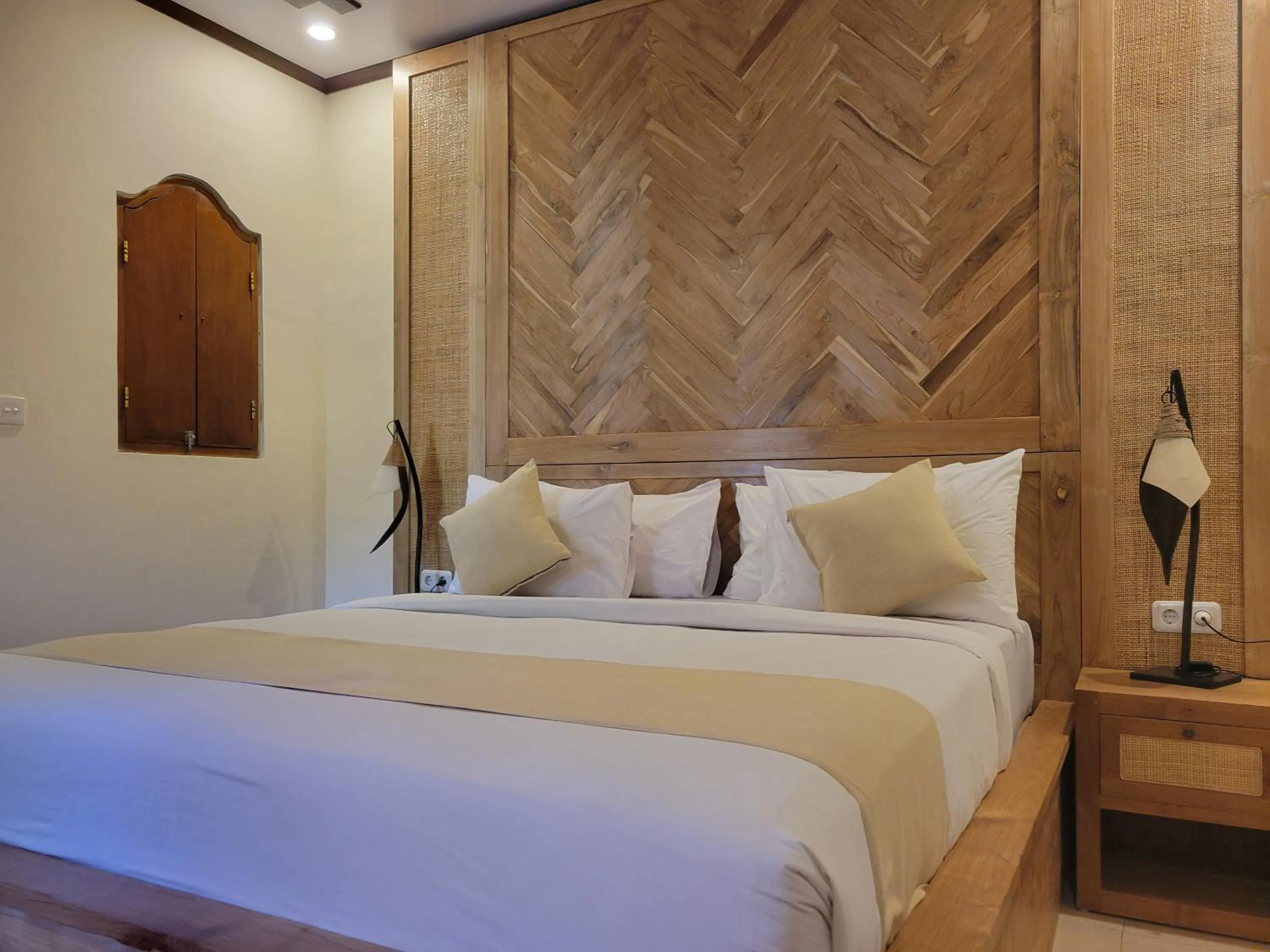 Bed in Kusnadi Hotel