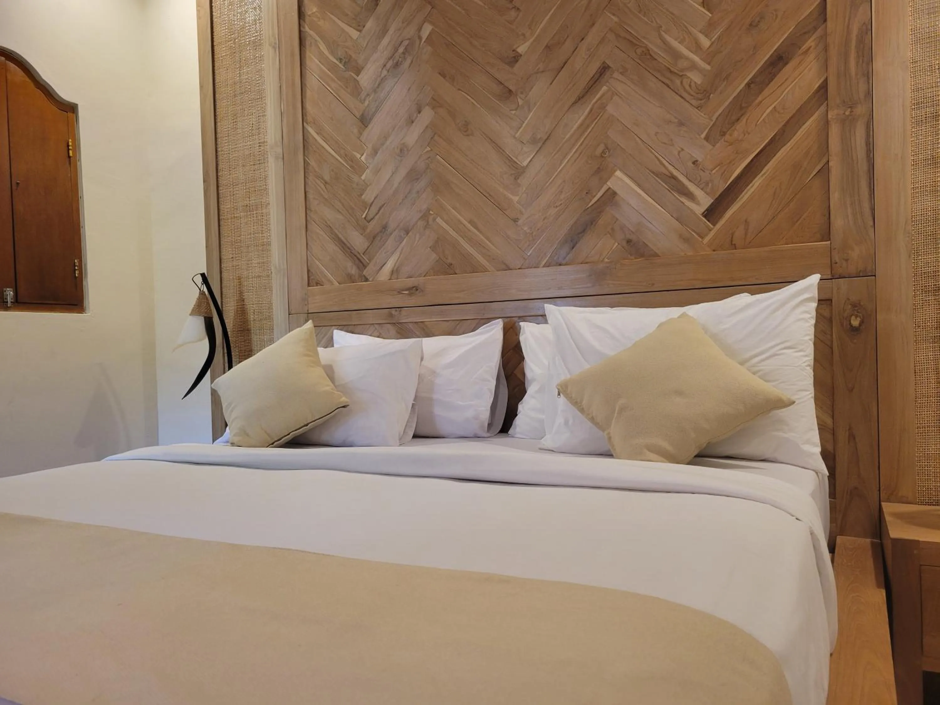 Bed in Kusnadi Hotel