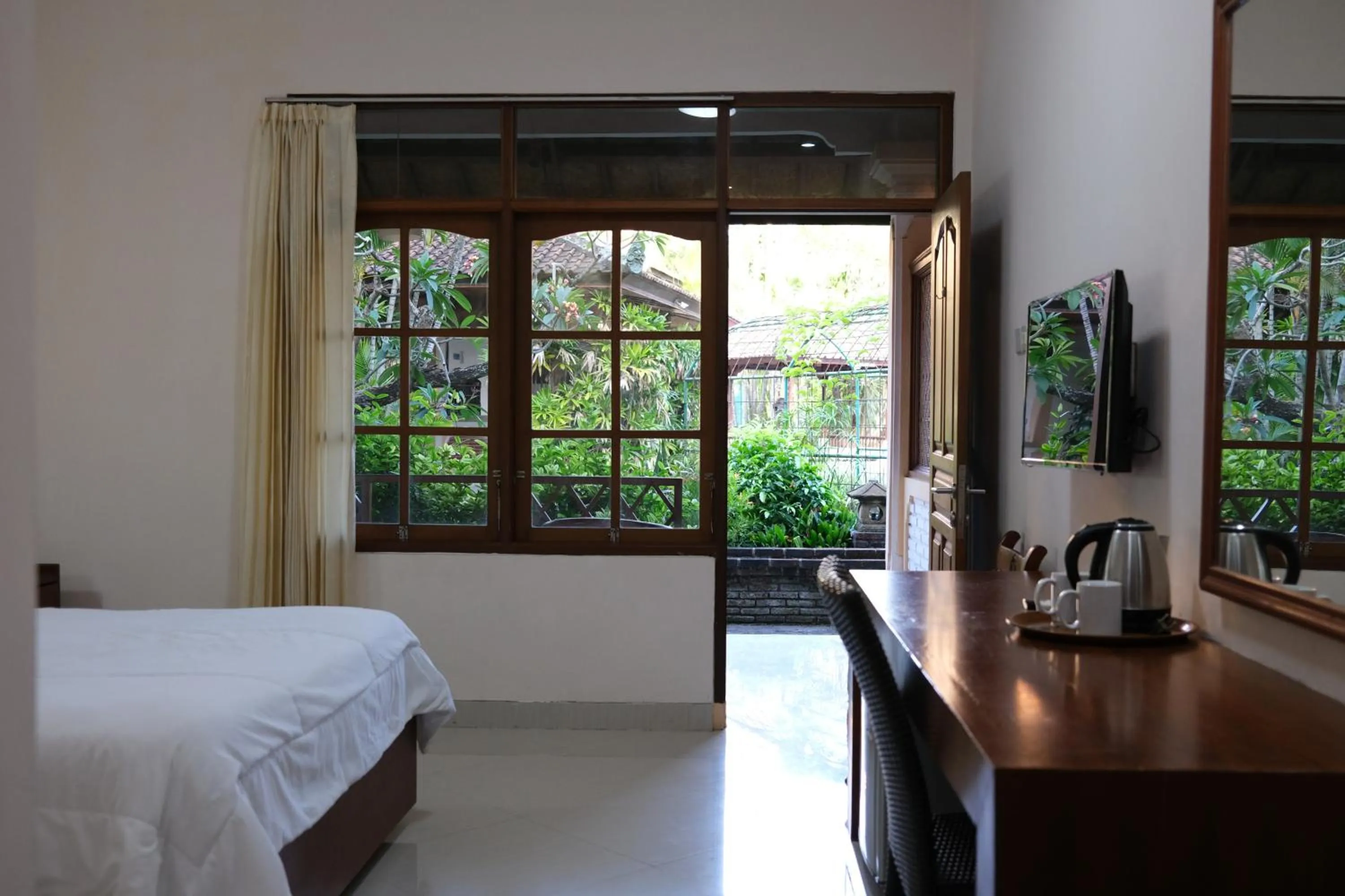 Garden view, Bed in Fat Yogi Cottages