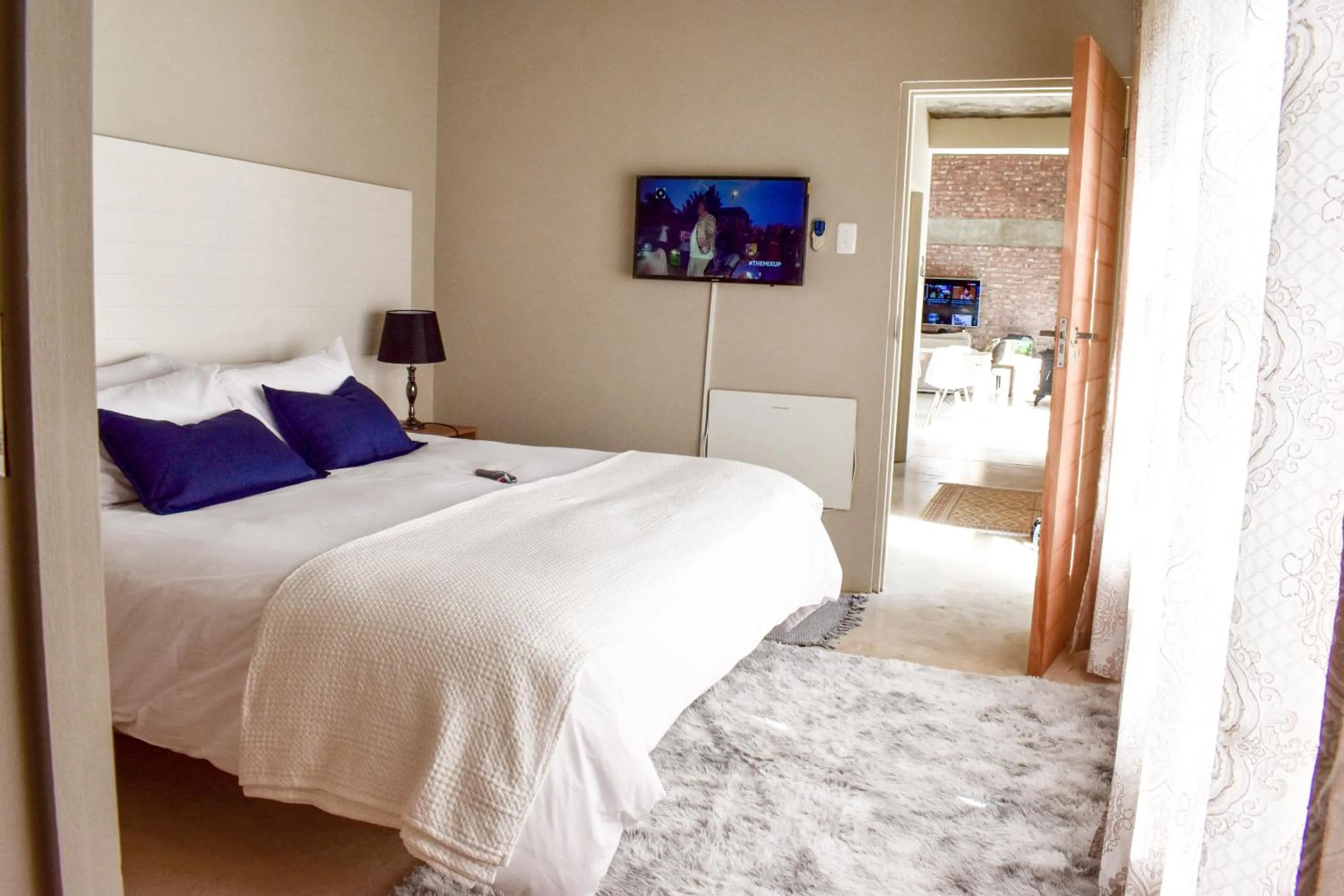 Bed in Amabwe Guesthouse