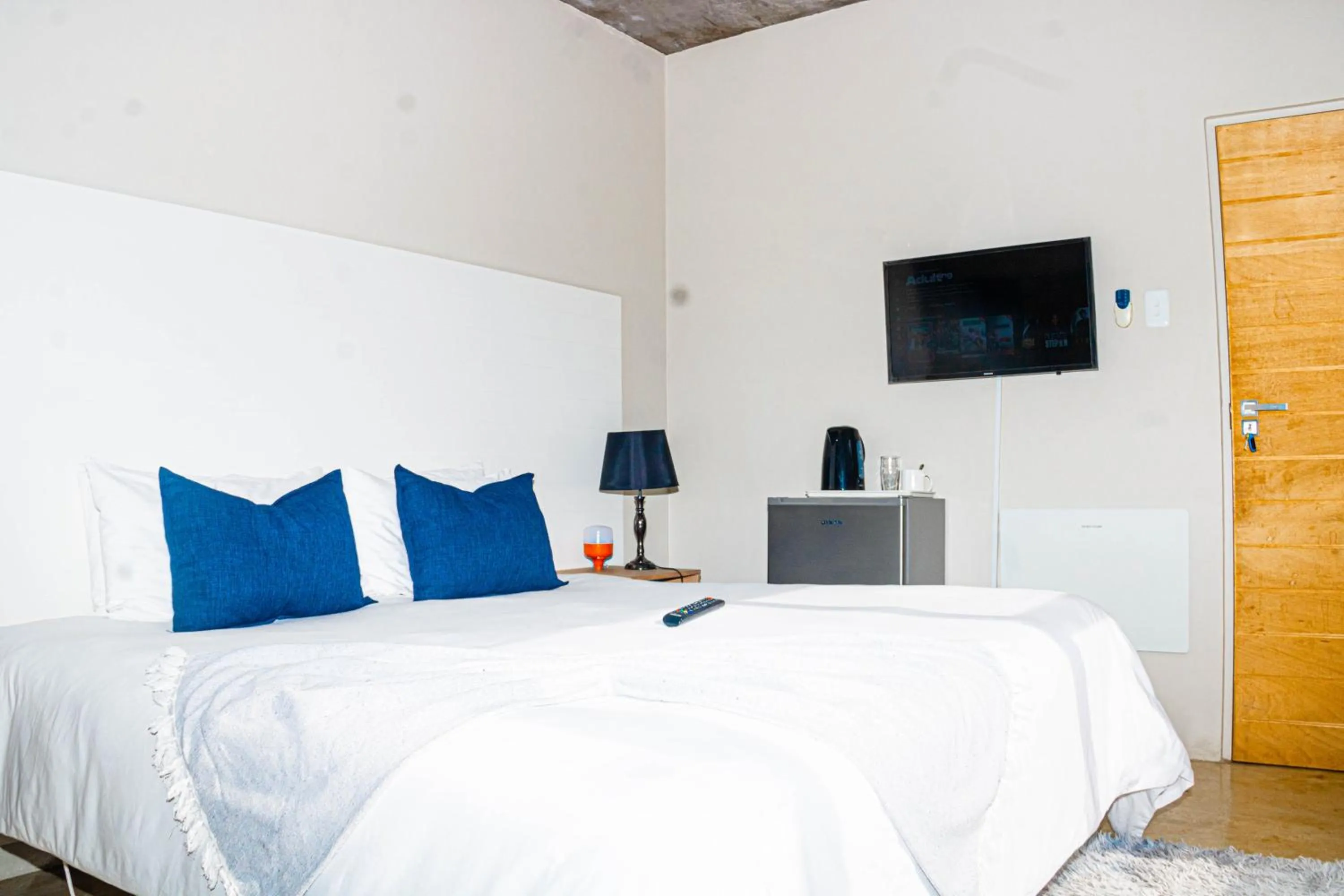 Bed in Amabwe Guesthouse