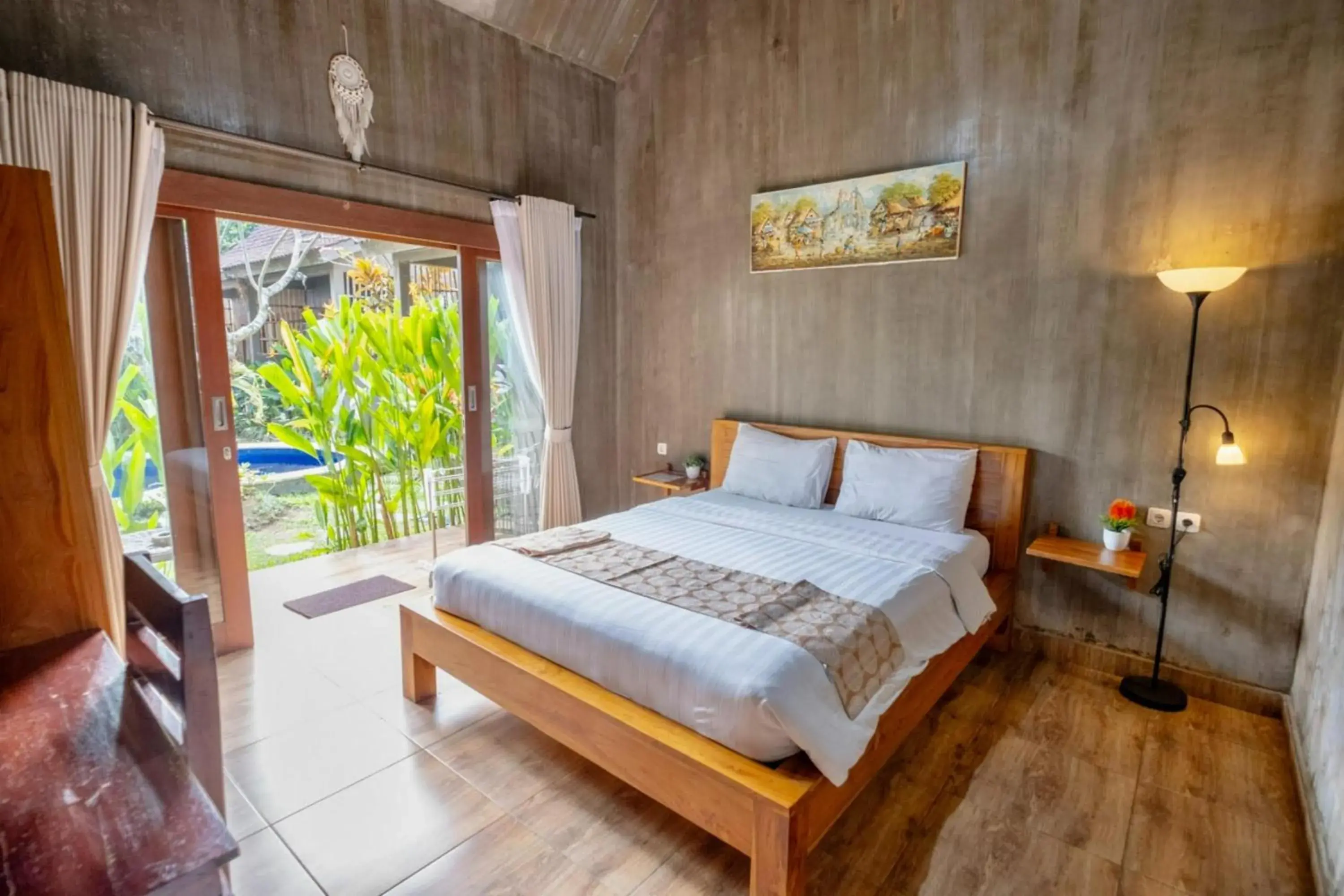 Double Room with Pool View in Elemento Homestay Badung Double Room with Pool View in Elemento Homestay Badung