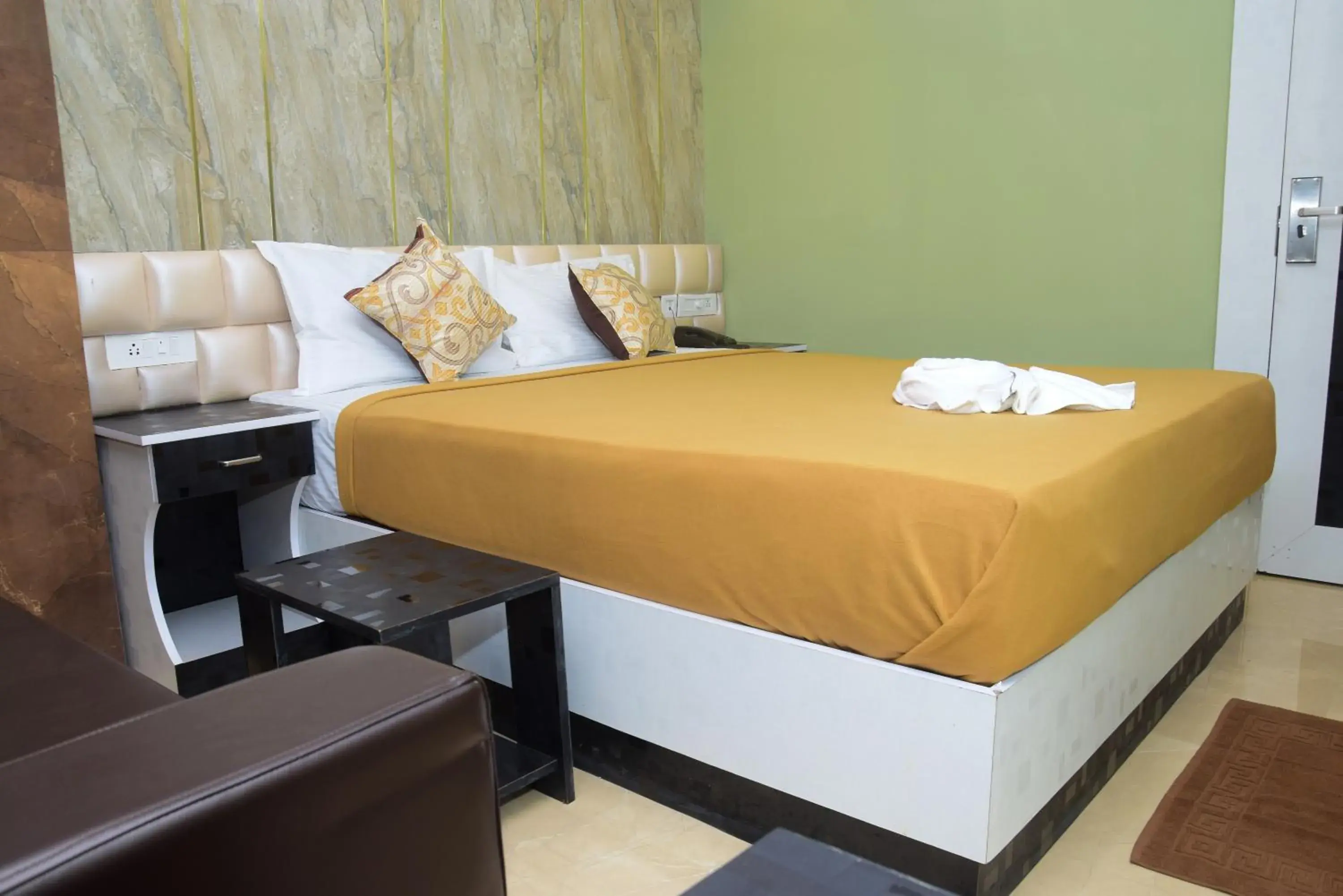 Bed in TGS Dine Inn Bed in TGS Dine Inn