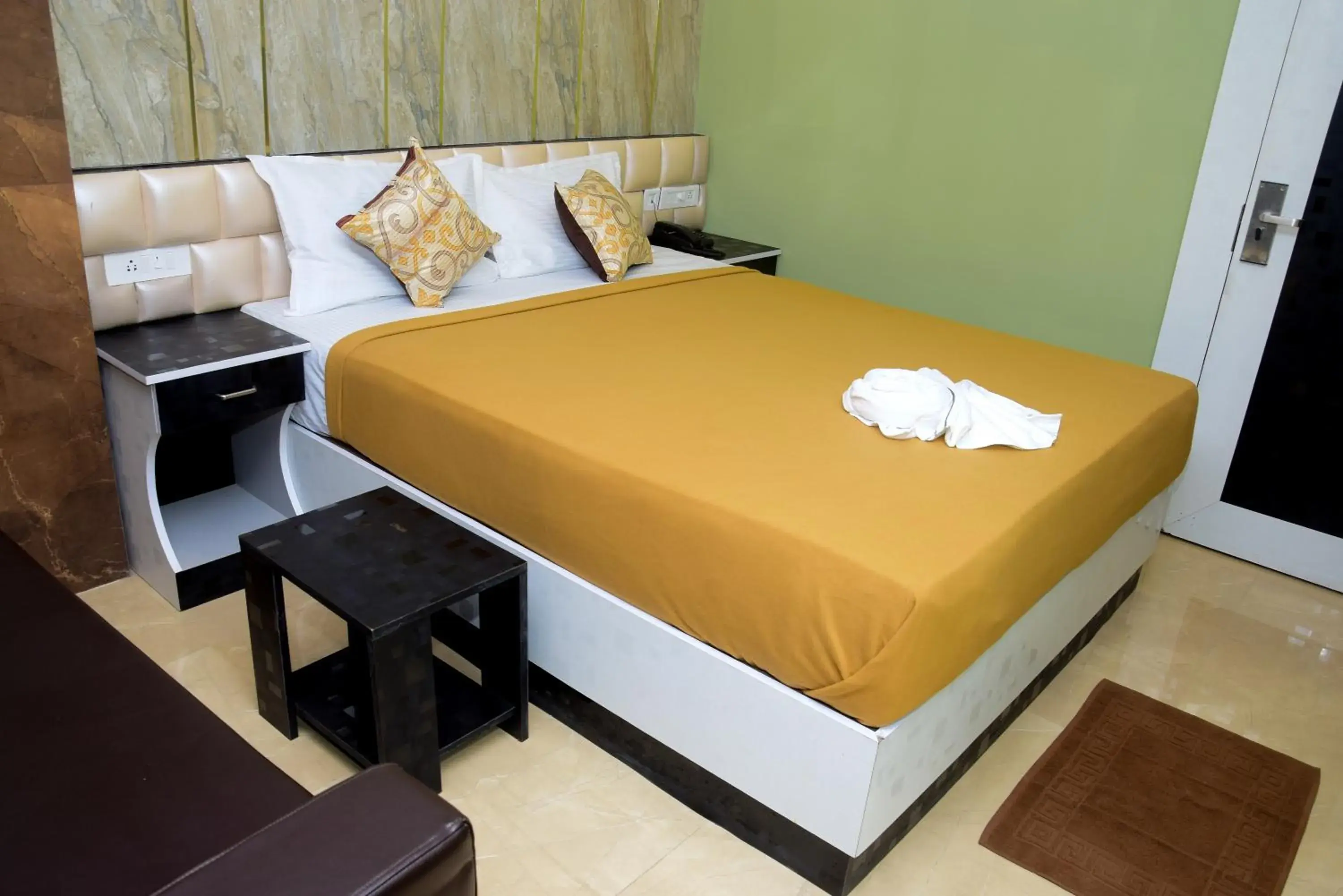 Bed in TGS Dine Inn Bed in TGS Dine Inn