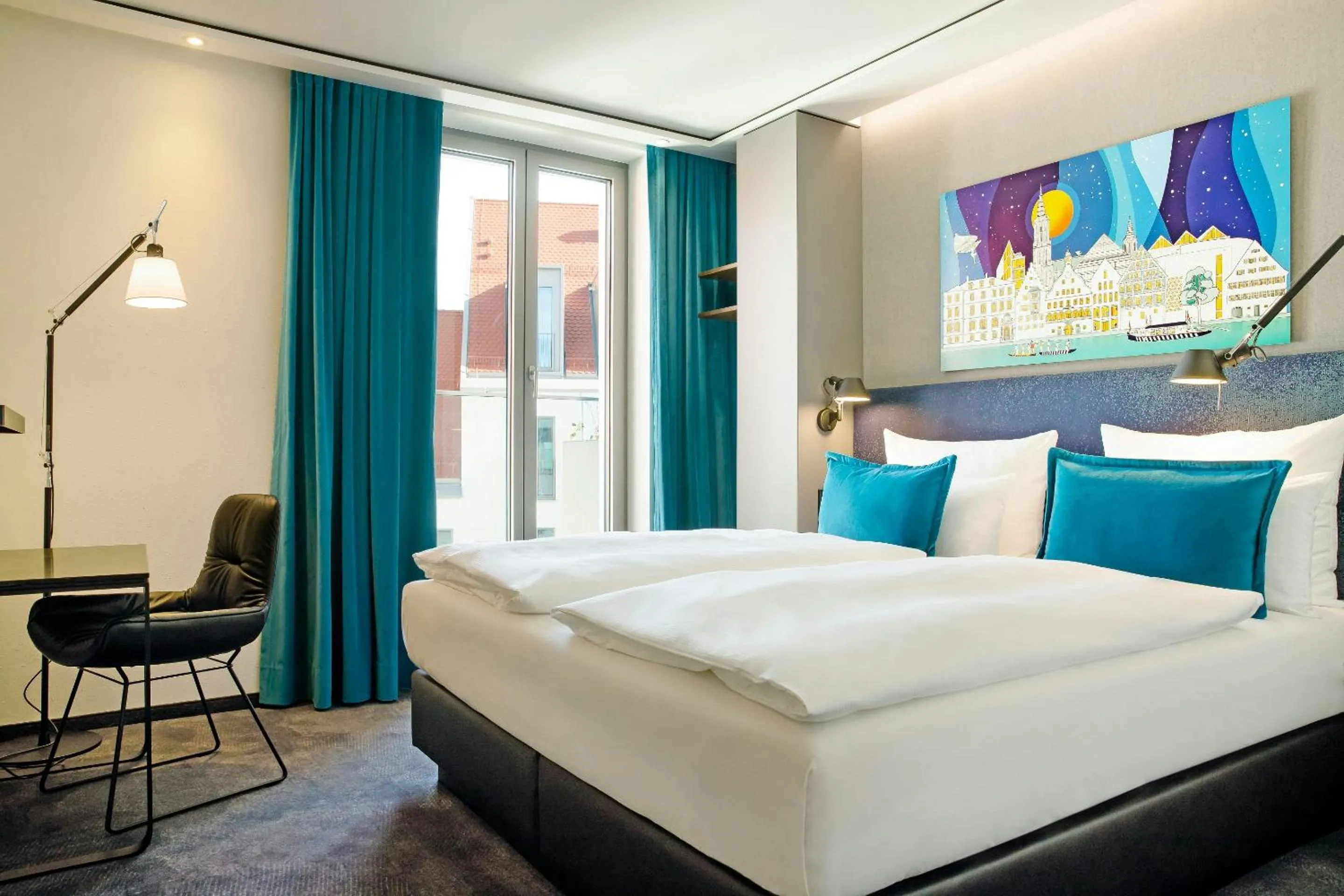 Photo of the whole room, Bed in Motel One Ulm