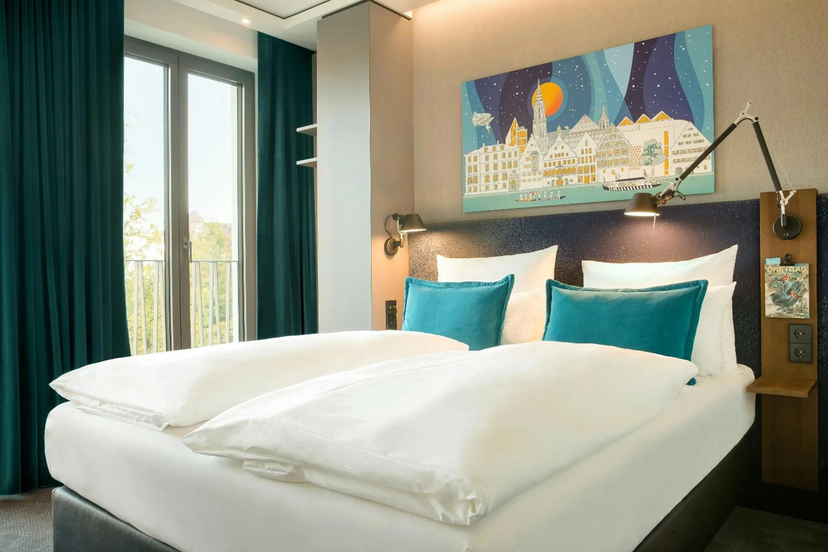 Photo of the whole room, Bed in Motel One Ulm