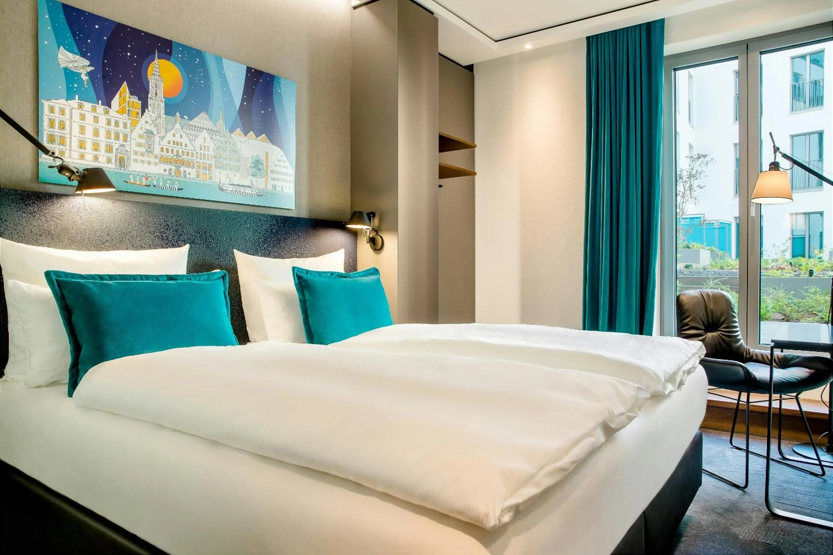 Photo of the whole room, Bed in Motel One Ulm