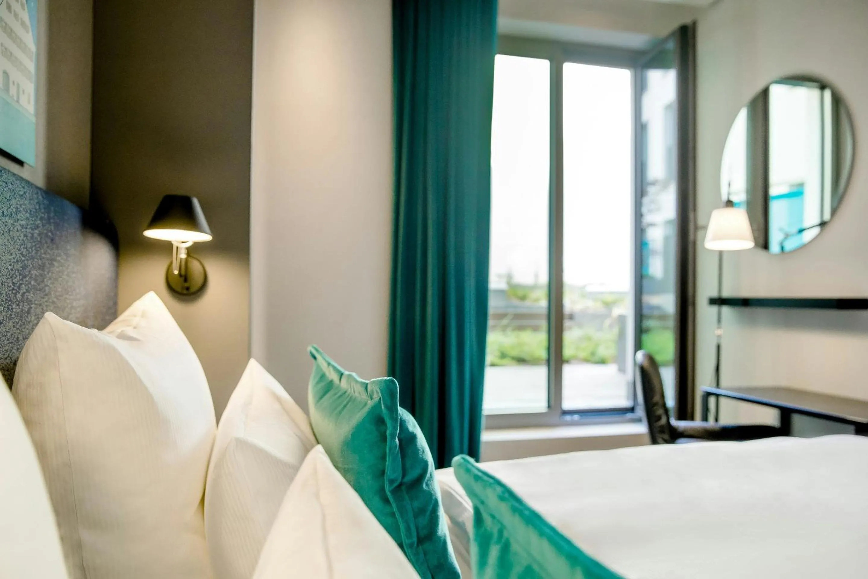 Photo of the whole room, Bed in Motel One Ulm