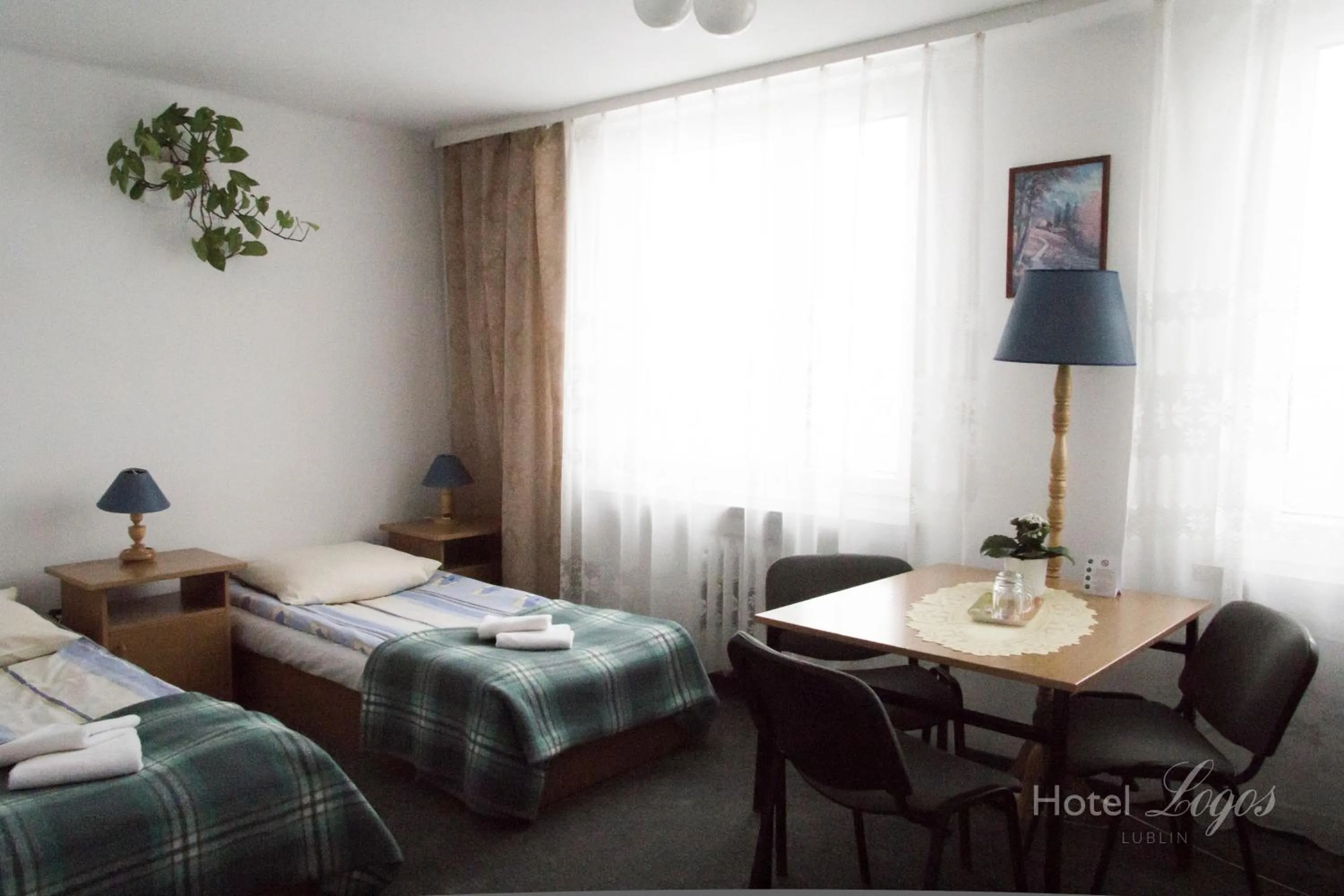 Photo of the whole room, Bed in Hotel Logos