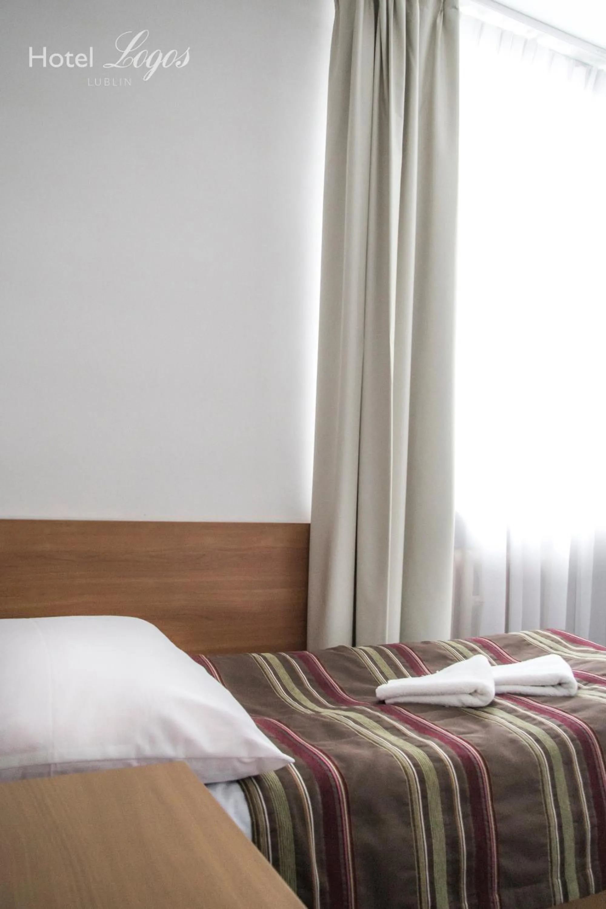 Bed in Hotel Logos