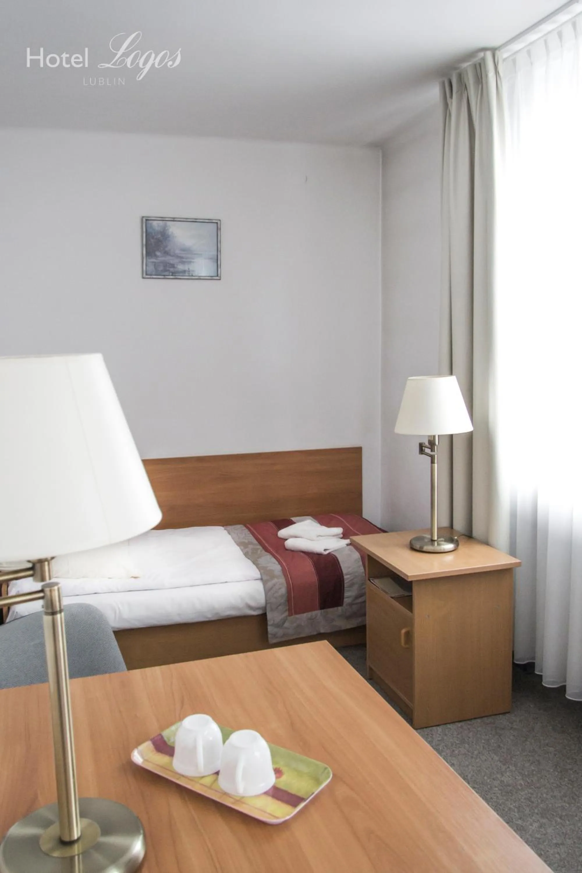 Bed in Hotel Logos