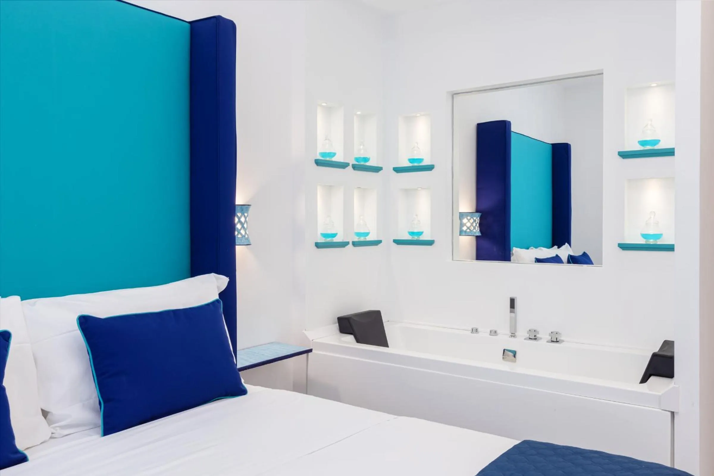 Bed in Blue Splendor Sorrento Apartment