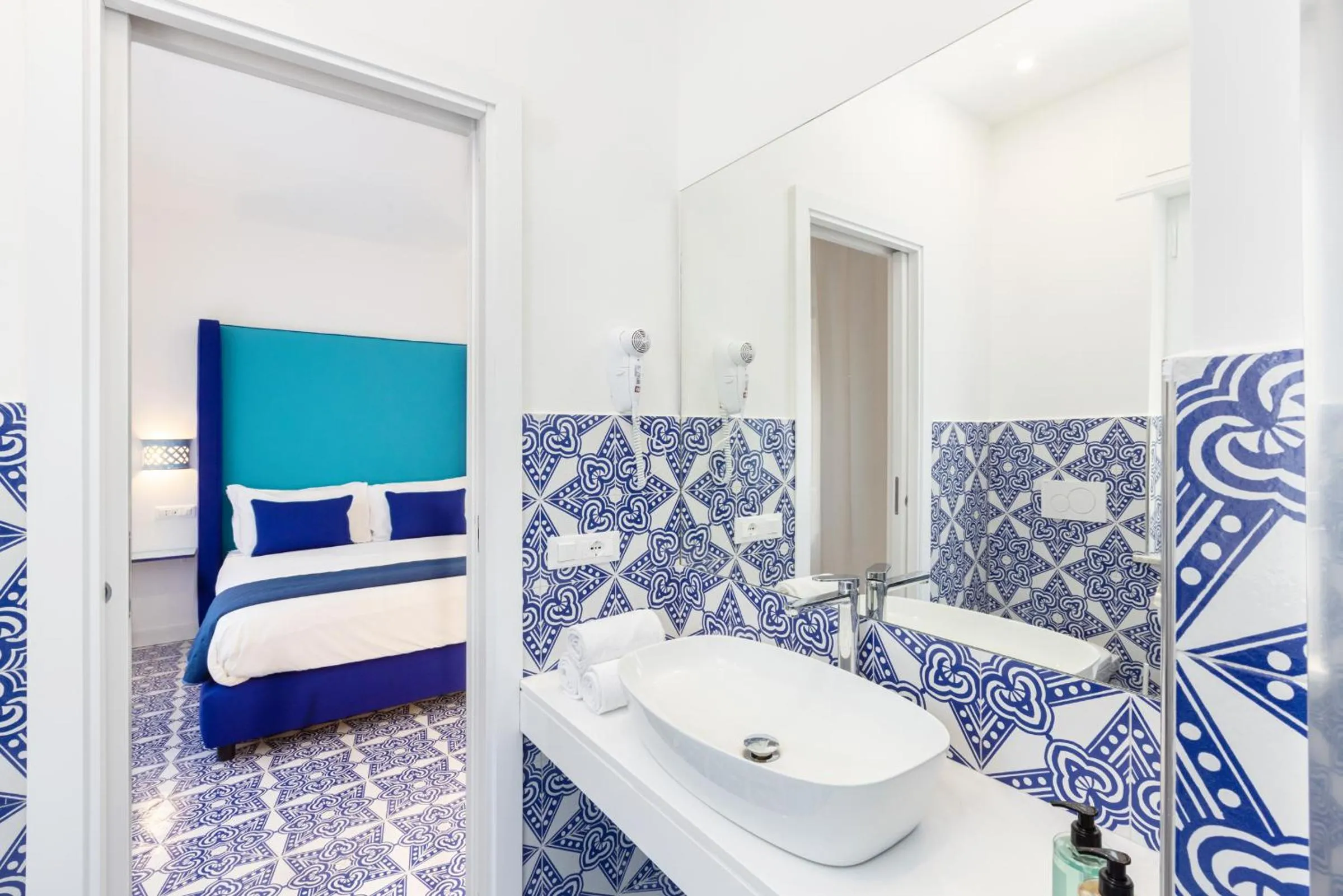 Bathroom, Bed in Blue Splendor Sorrento Apartment