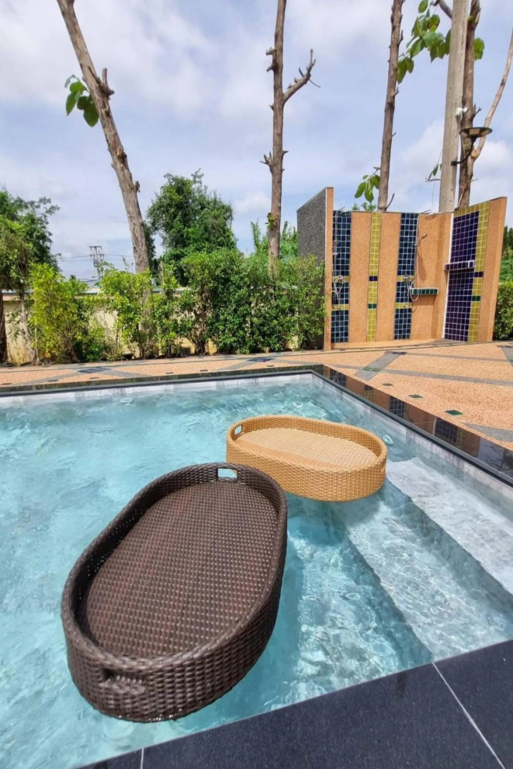 Swimming pool in Siri Nakornpink Chiang Mai Hotel SHA Plus