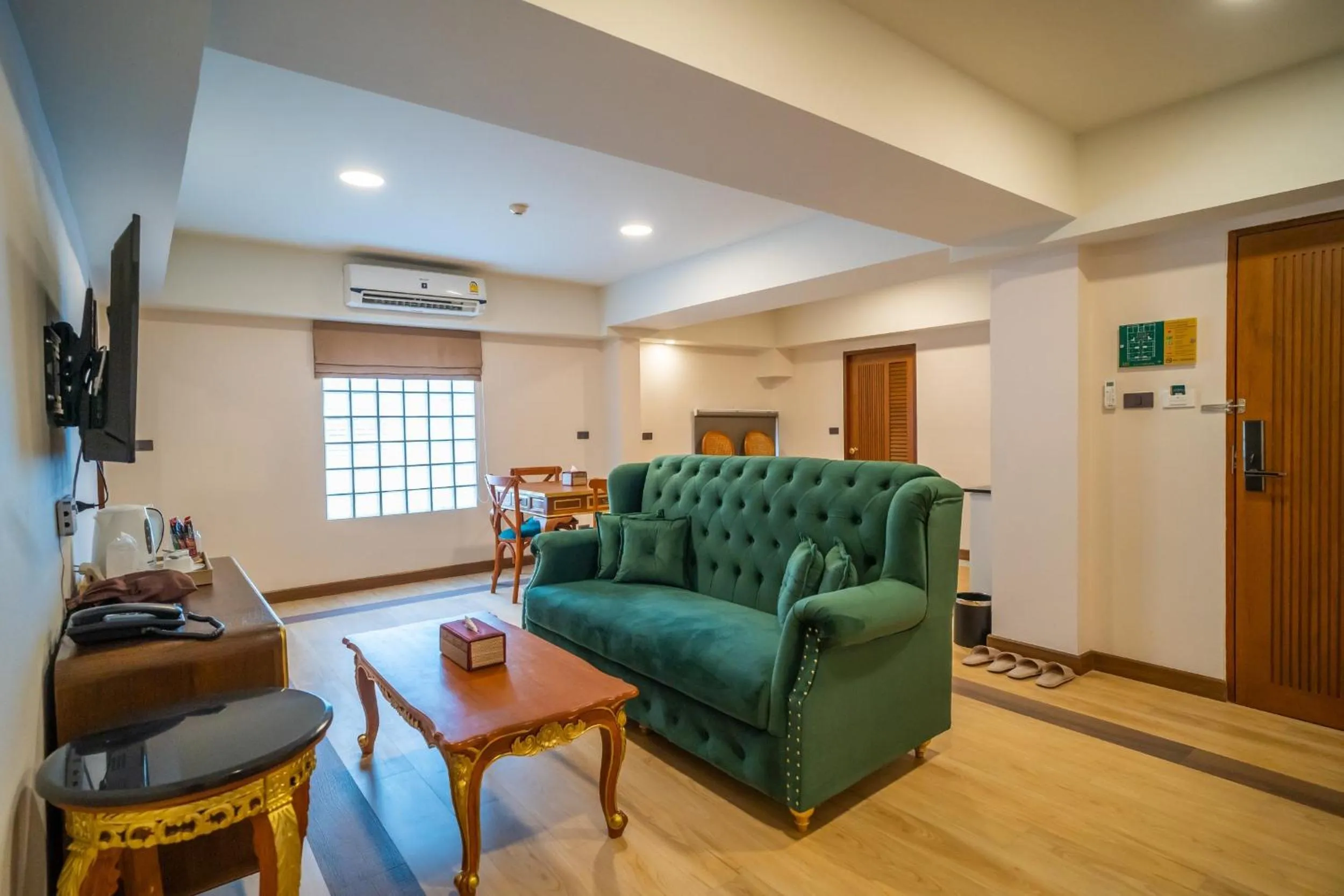 Living room in Siri Nakornpink Chiang Mai Hotel SHA Plus