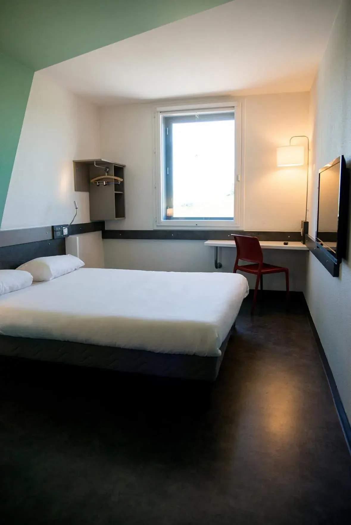 Bed in Ibis Budget Archamps Porte de Genève Bed in Ibis Budget Archamps Porte de Genève