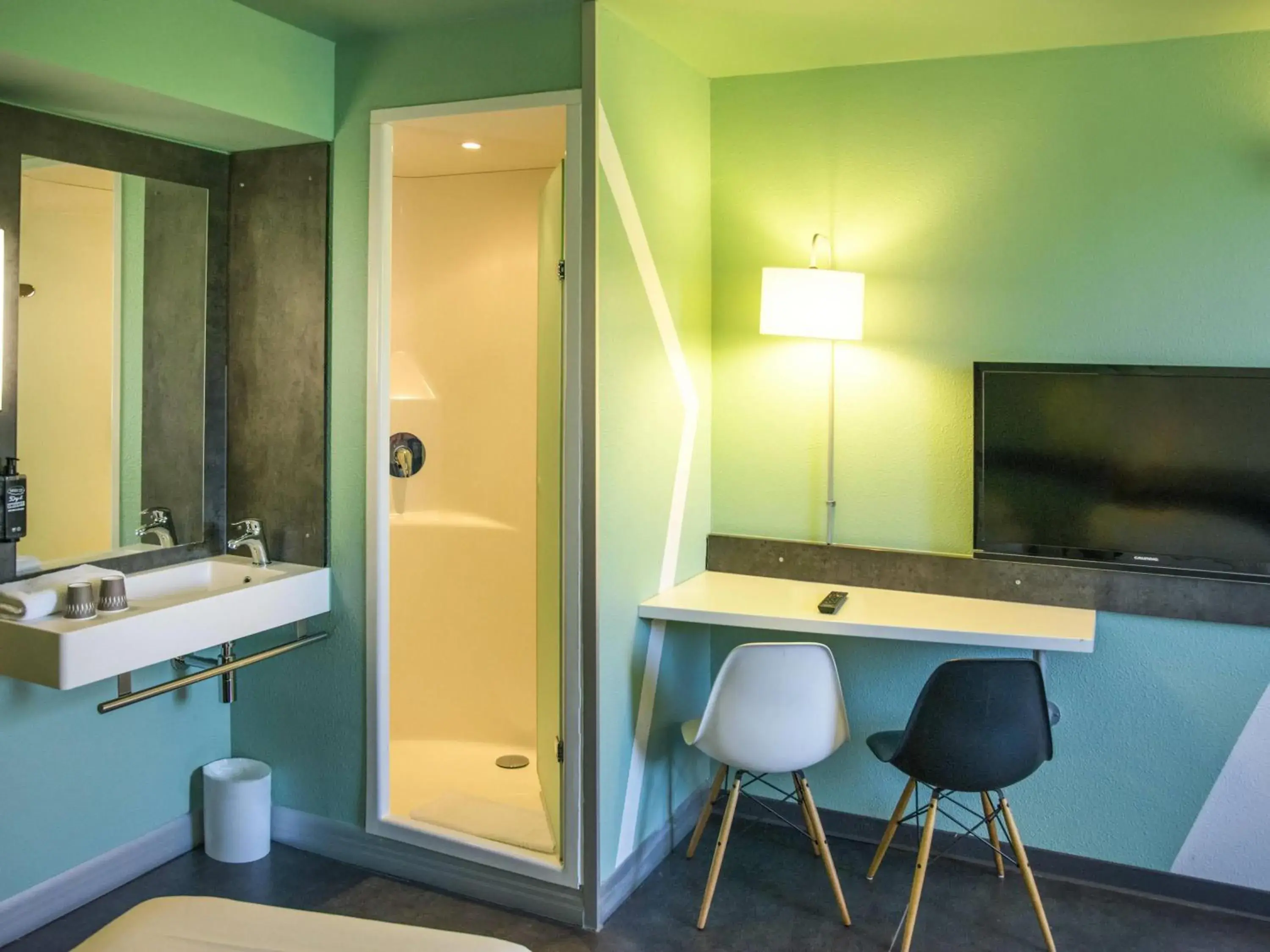 Bedroom in Ibis Budget Archamps Porte de Genève Bedroom in Ibis Budget Archamps Porte de Genève