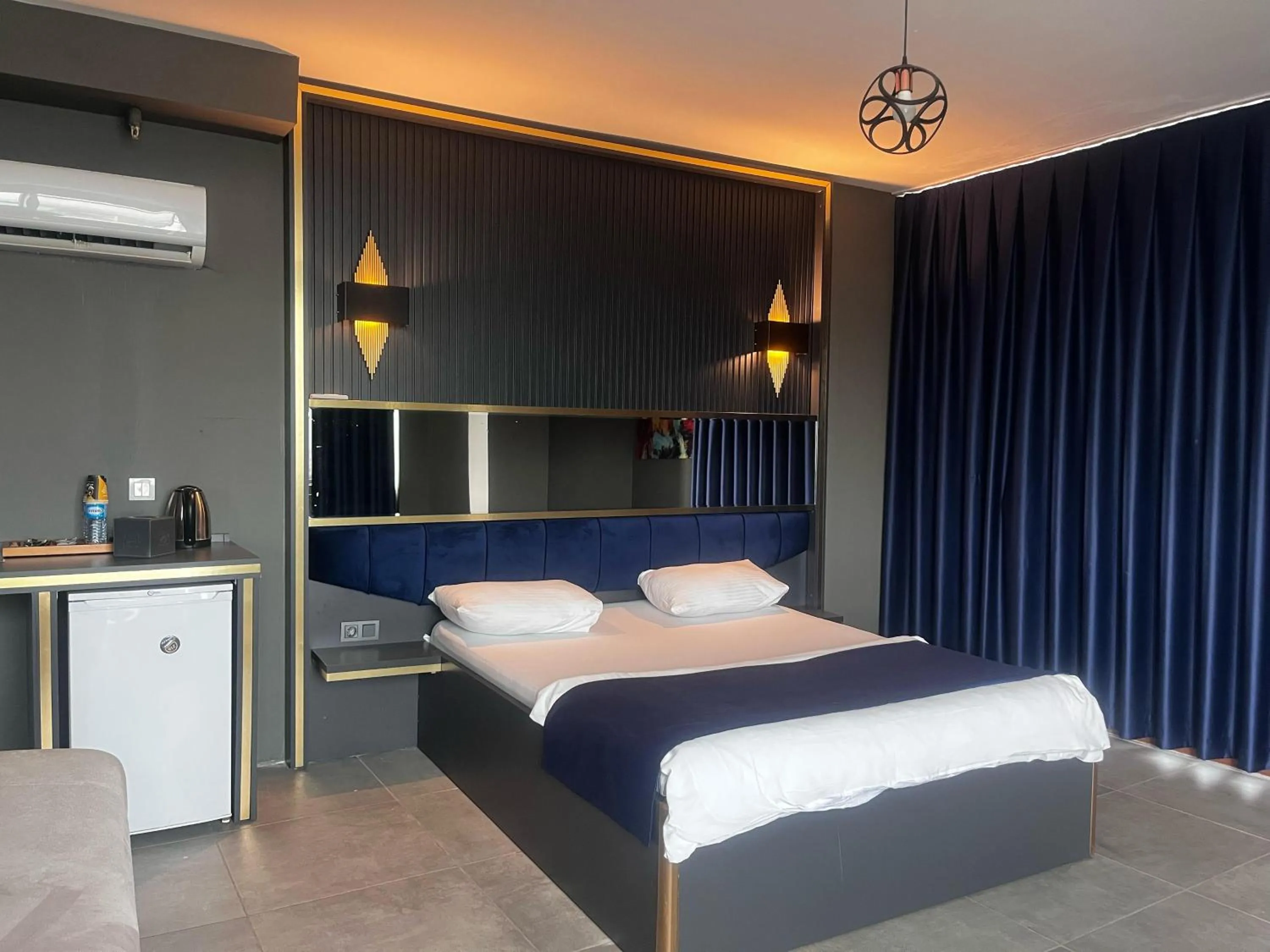 Bed in 216 Hill Suites