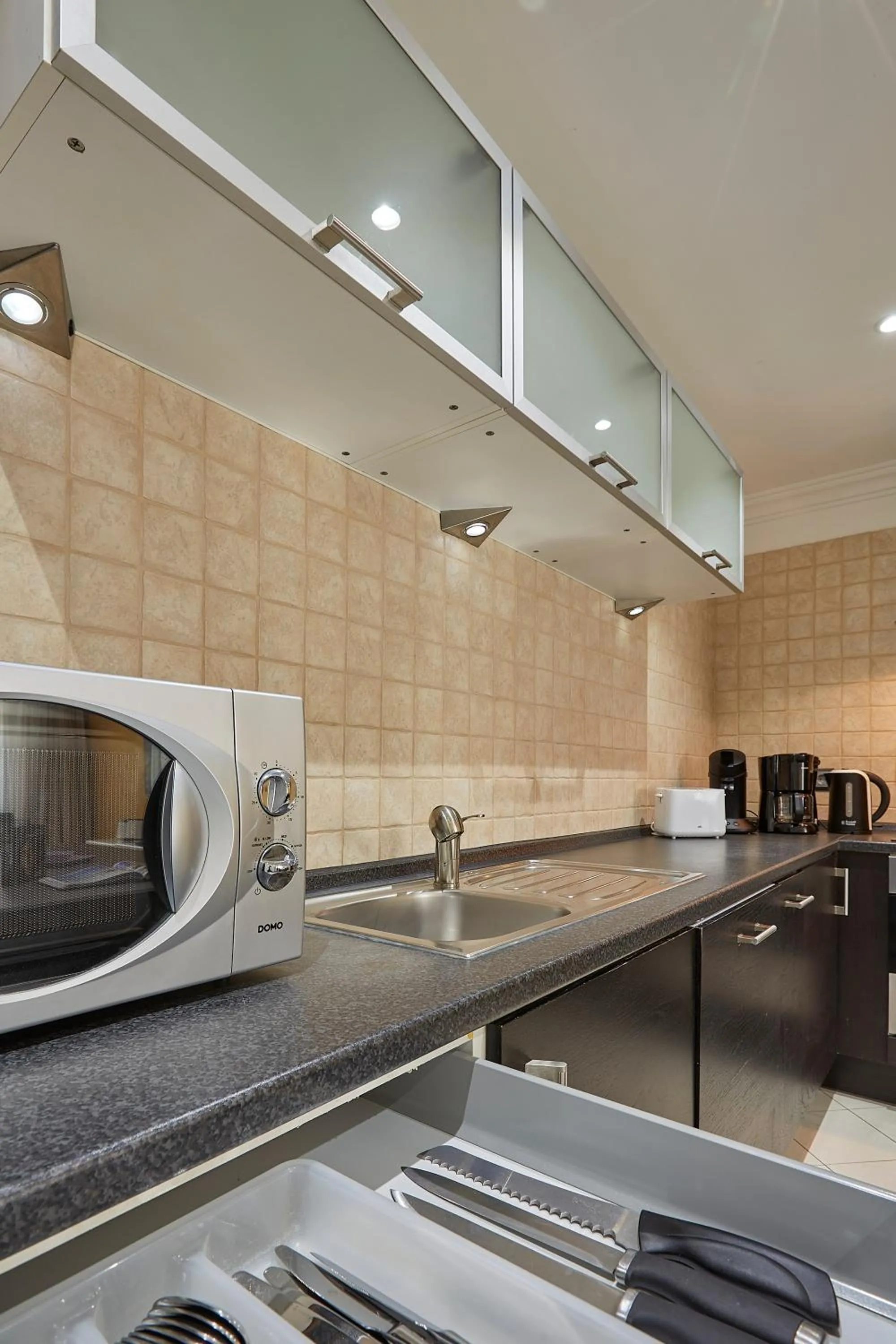 kitchen in The Queen Luxury Apartments - Villa Cortina