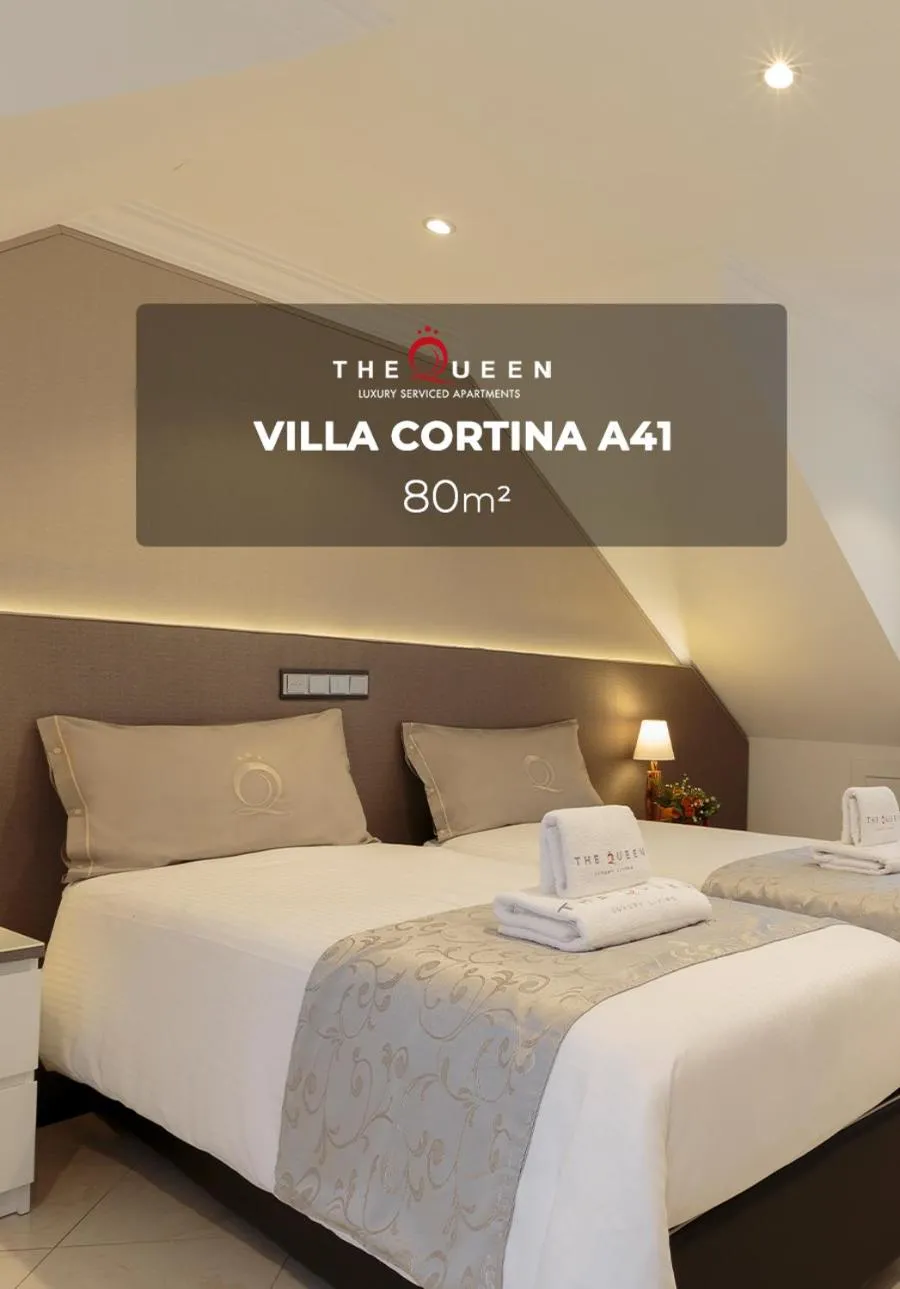 Property logo or sign, Bed in The Queen Luxury Apartments - Villa Cortina