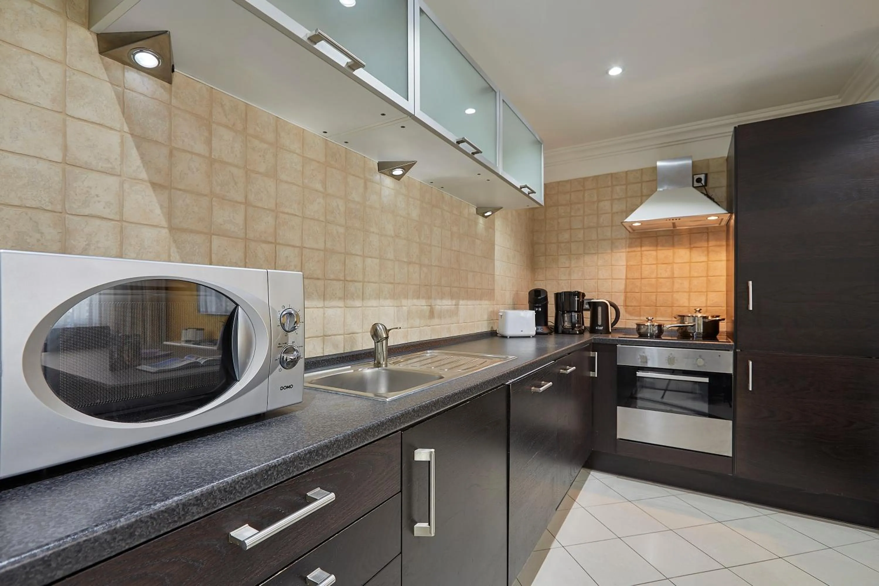 kitchen in The Queen Luxury Apartments - Villa Cortina