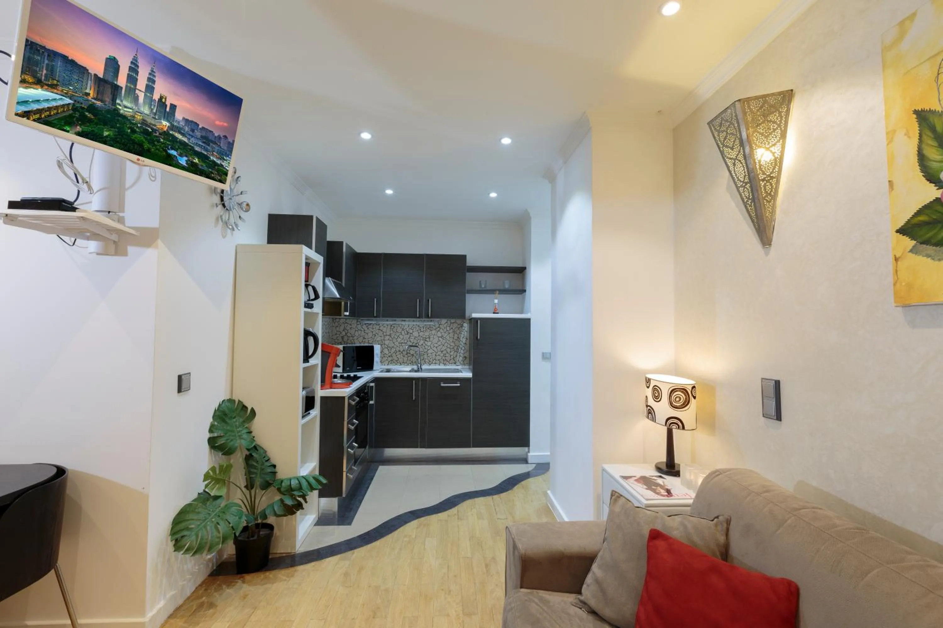 TV and multimedia in The Queen Luxury Apartments - Villa Cortina