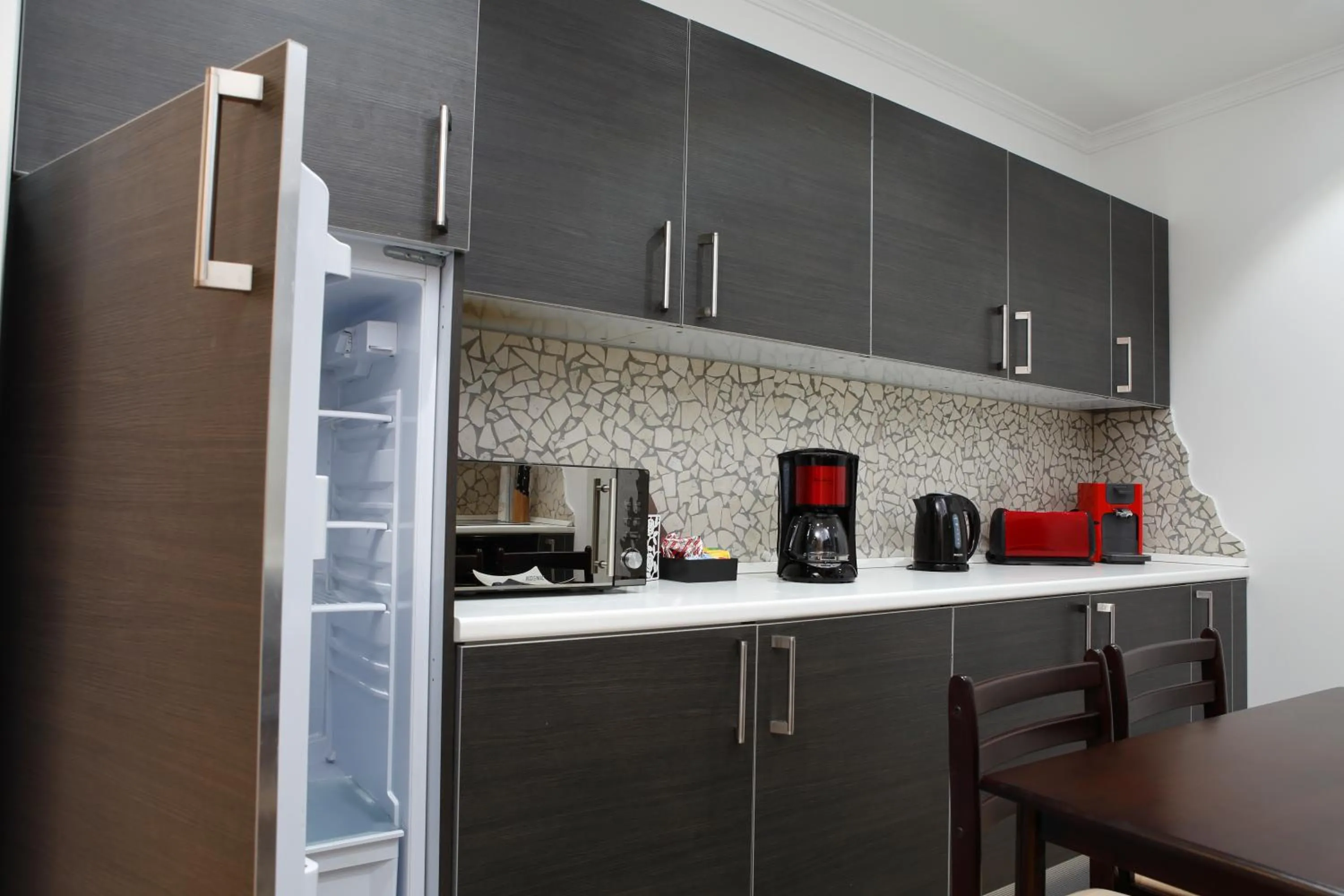 Kitchen or kitchenette in The Queen Luxury Apartments - Villa Cortina