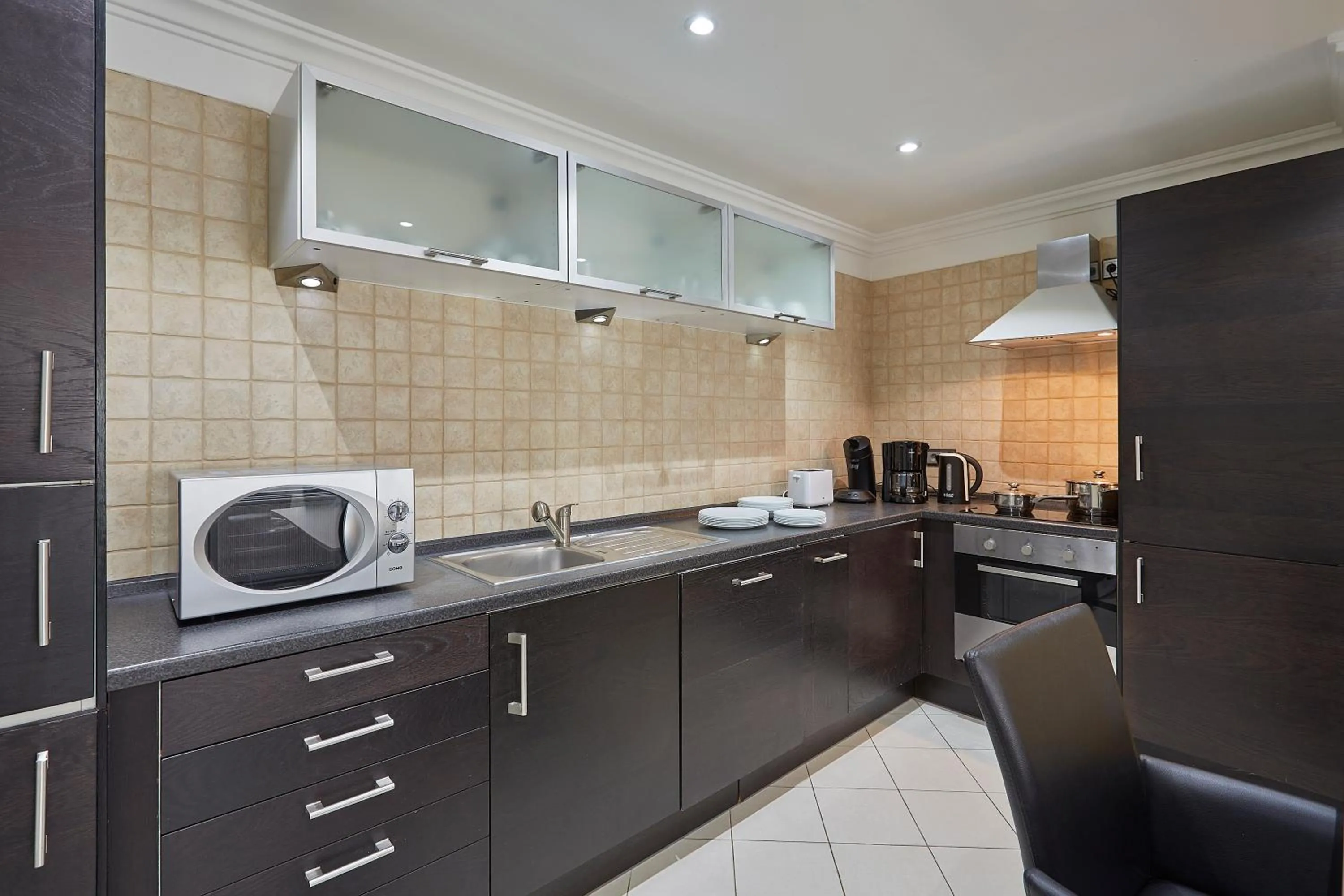 kitchen in The Queen Luxury Apartments - Villa Cortina