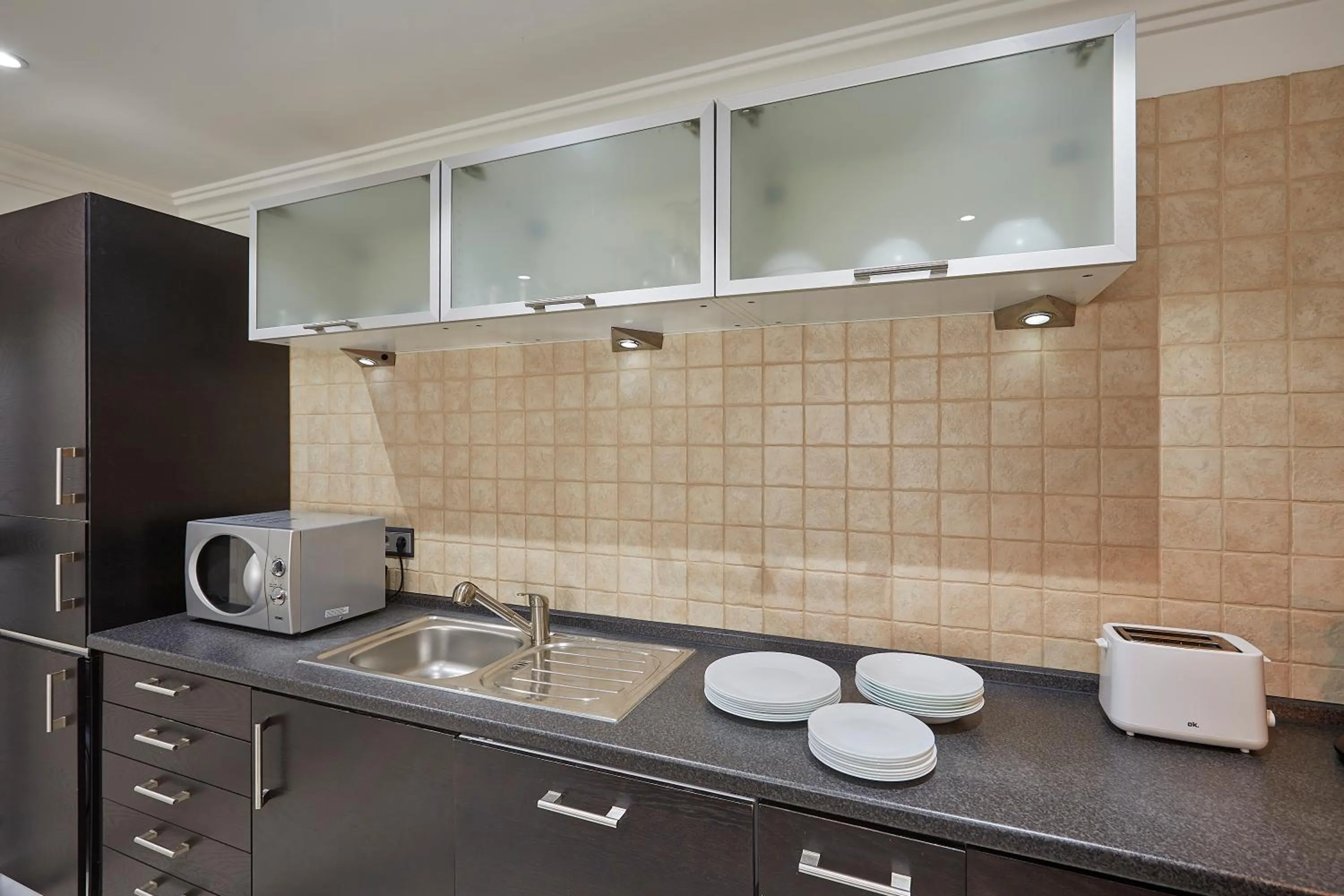 kitchen in The Queen Luxury Apartments - Villa Cortina