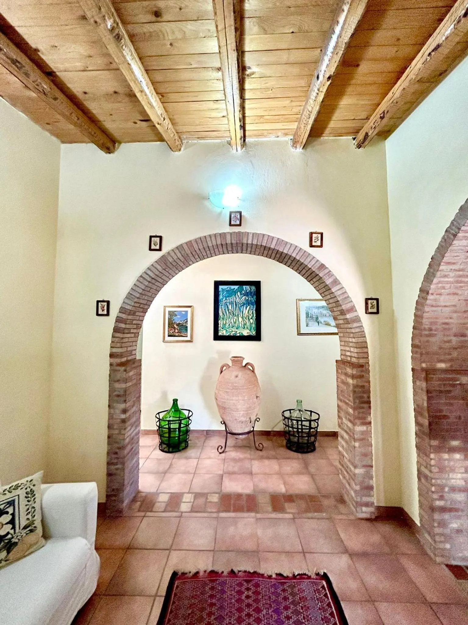 Seating area in Case Di Loco Castro