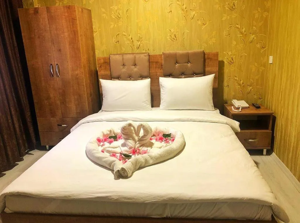 Bed in BIG MOLLS HOTEL