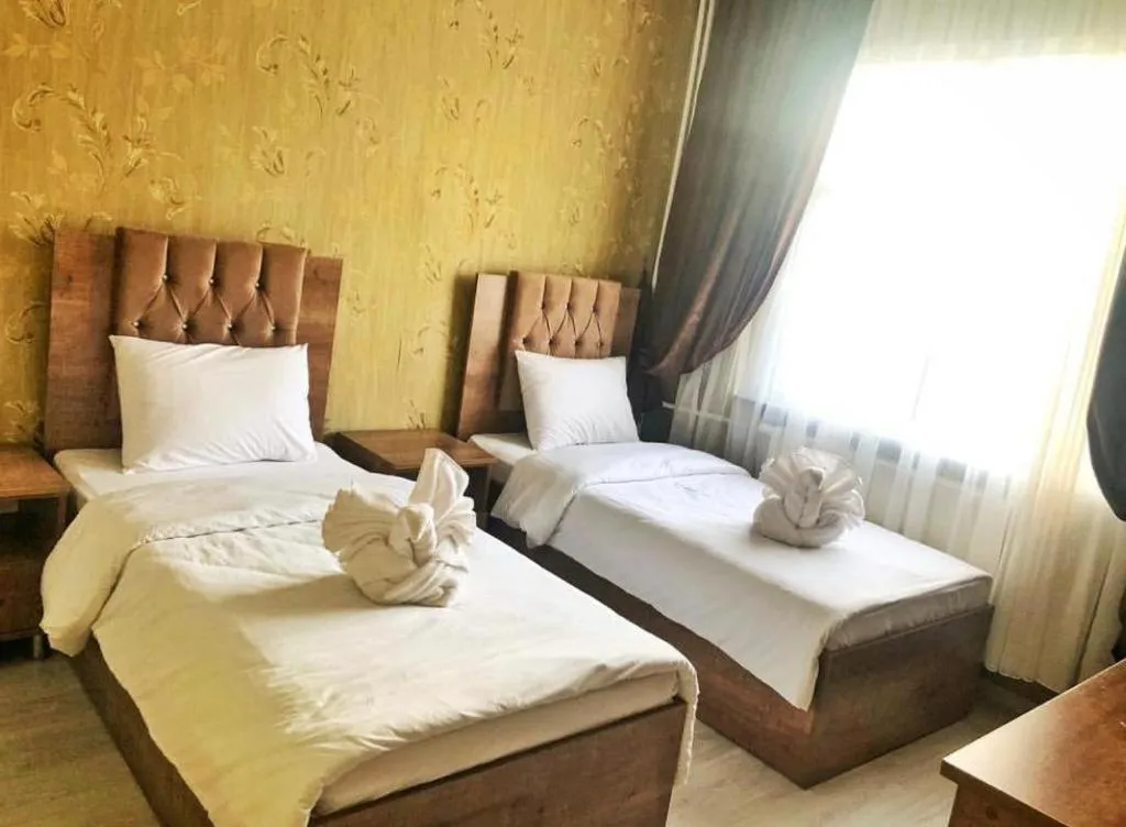 Bed in BIG MOLLS HOTEL