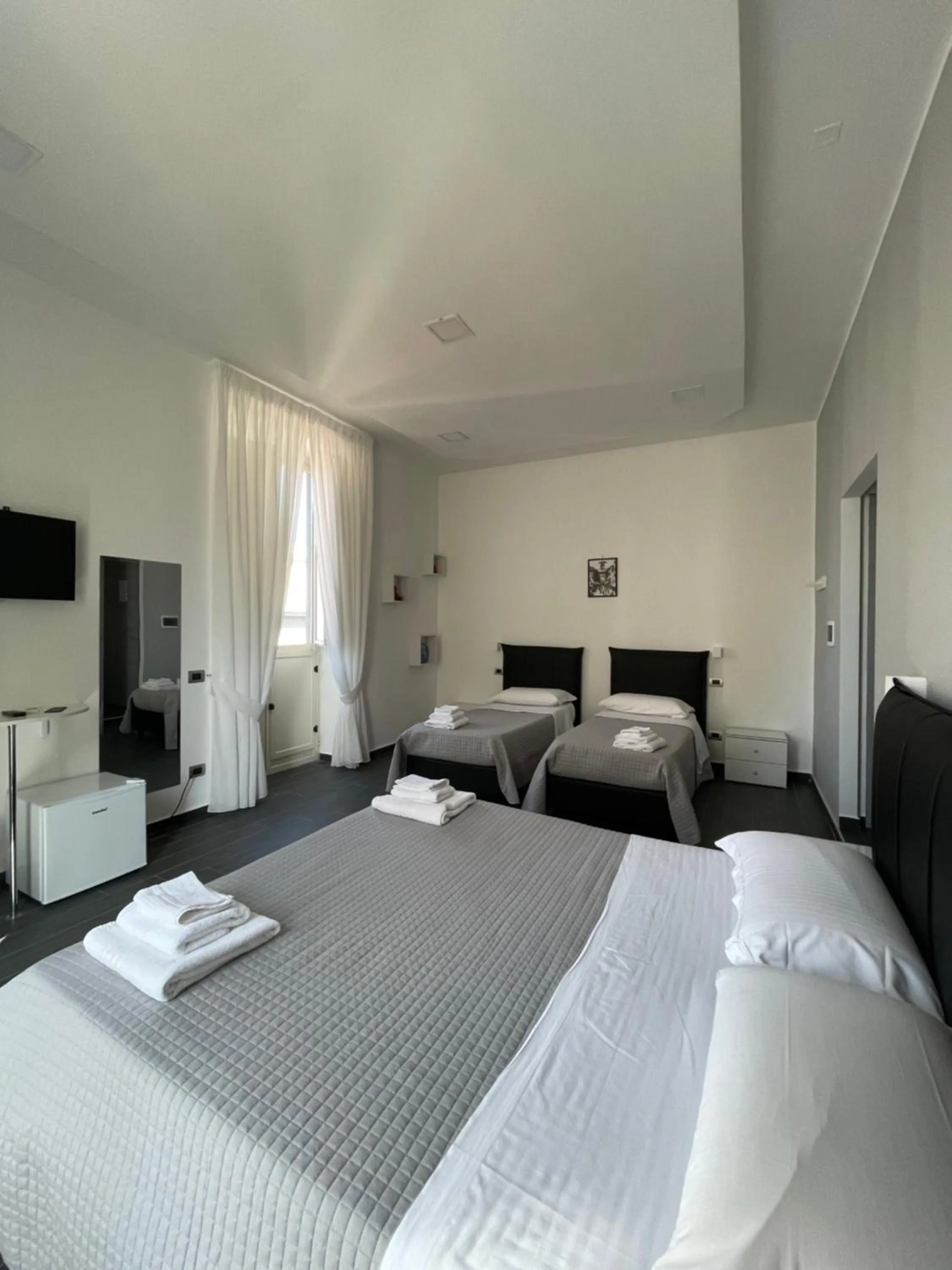 Bed in Le Porte di Napoli - Rooms